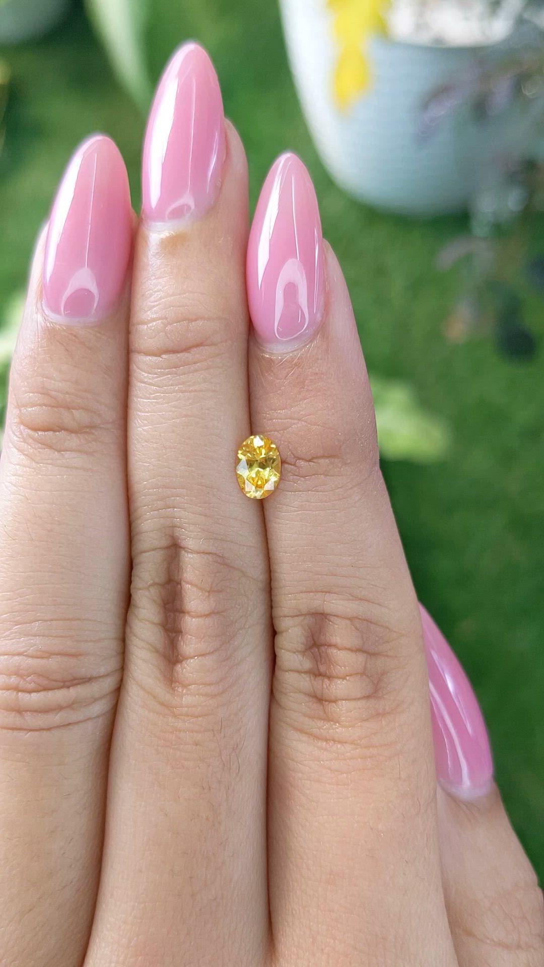 0.60 Ct. Orangish Yellow Sapphire from Ceylon (Sri Lanka) Size Video