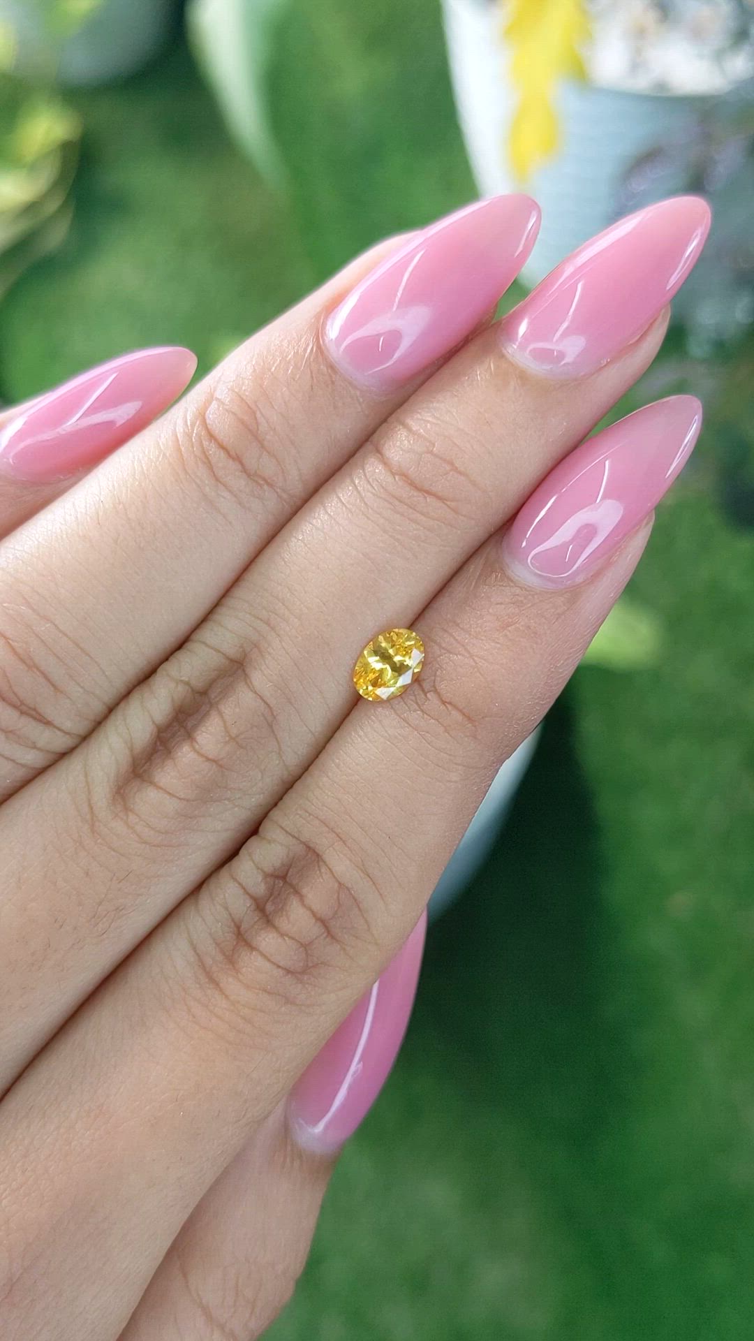 0.60 Ct. Orangish Yellow Sapphire from Ceylon (Sri Lanka) Size Video