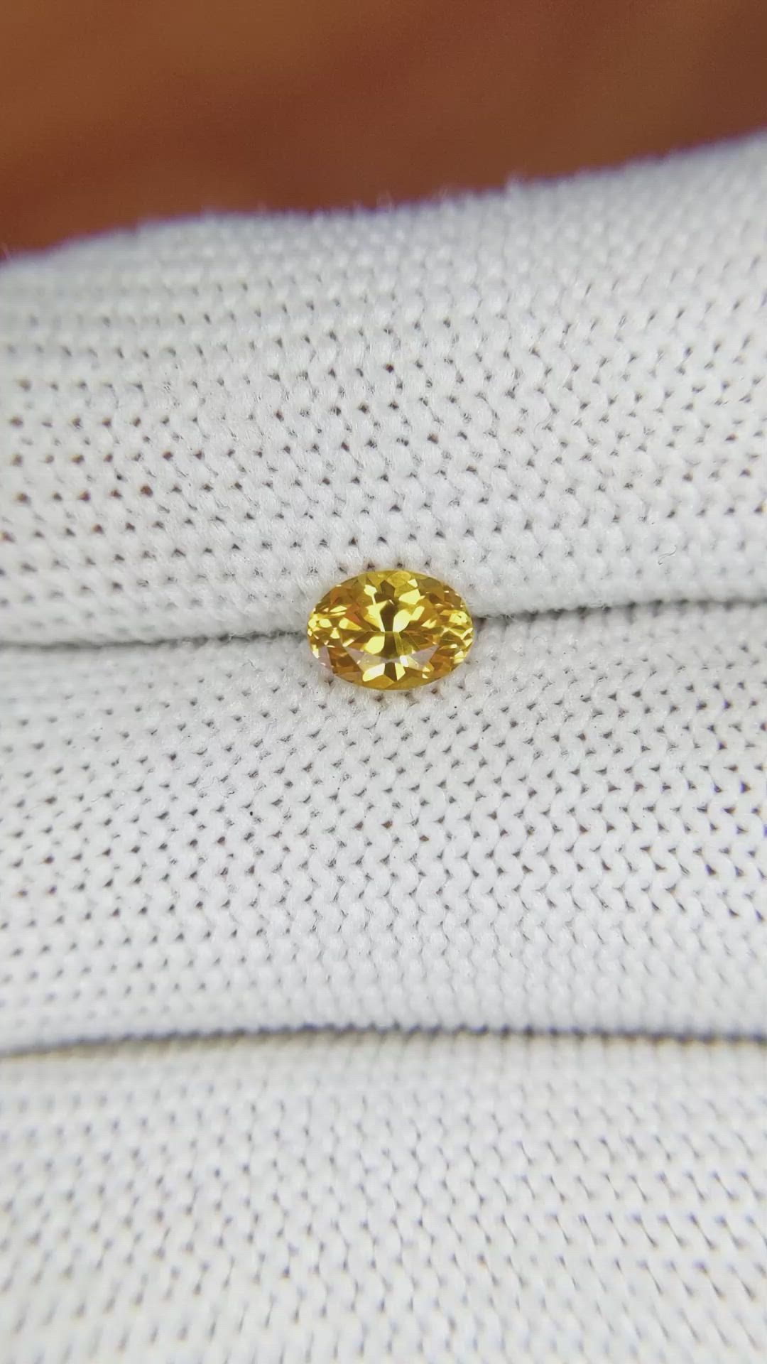 0.75 Ct. Yellowish Orange Sapphire from Ceylon (Sri Lanka) Size Video