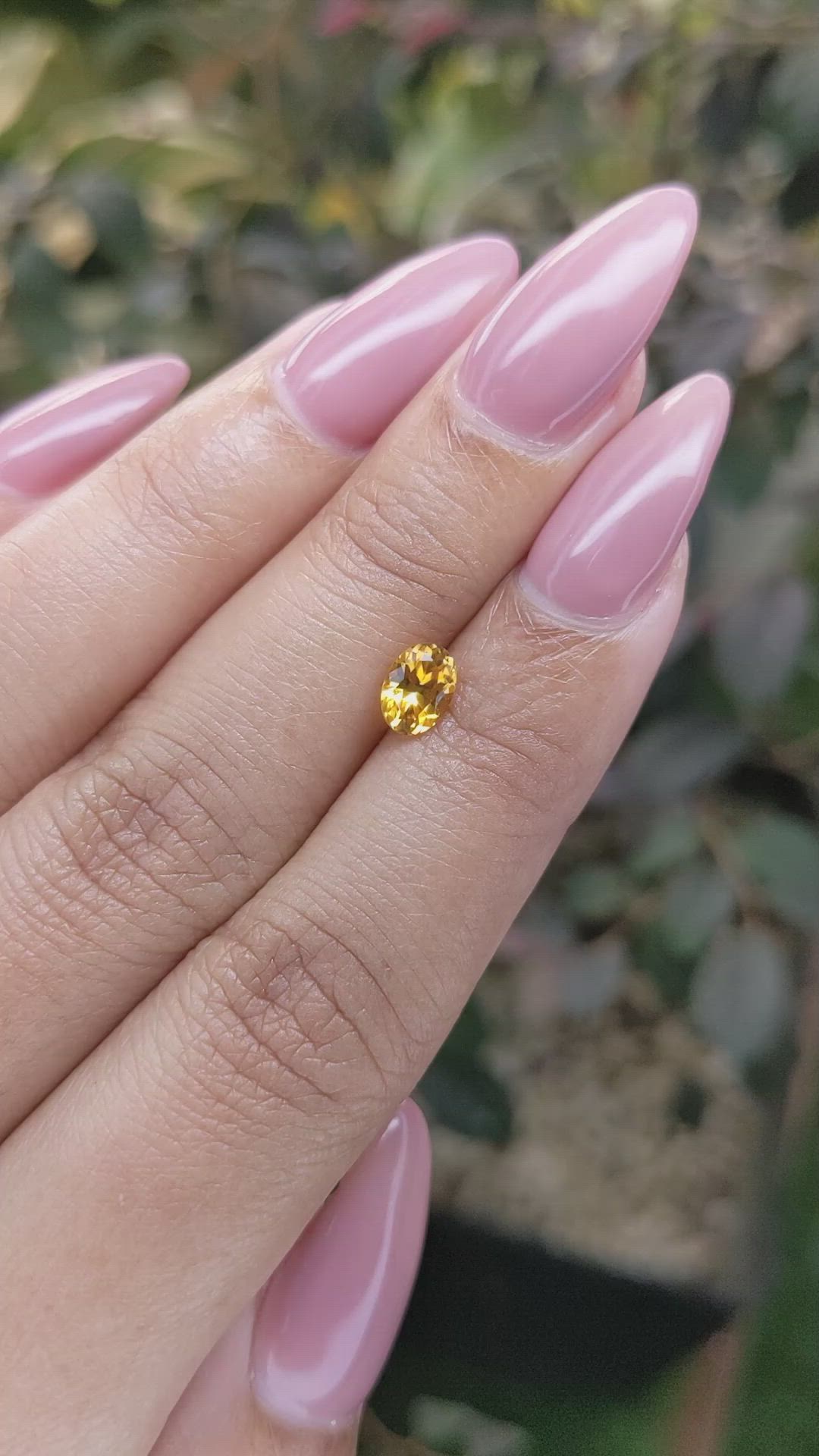 0.75 Ct. Yellowish Orange Sapphire from Ceylon (Sri Lanka) Size Video