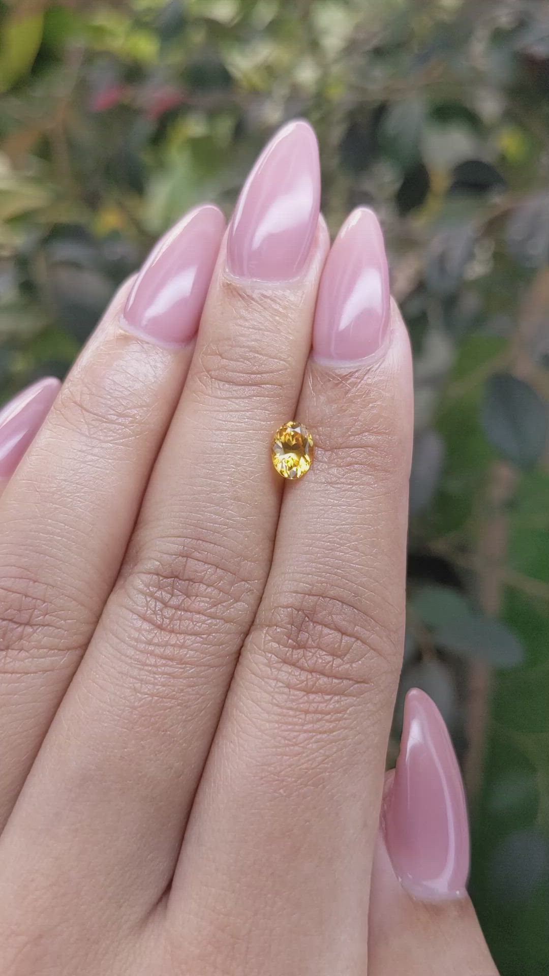 0.75 Ct. Yellowish Orange Sapphire from Ceylon (Sri Lanka) Size Video
