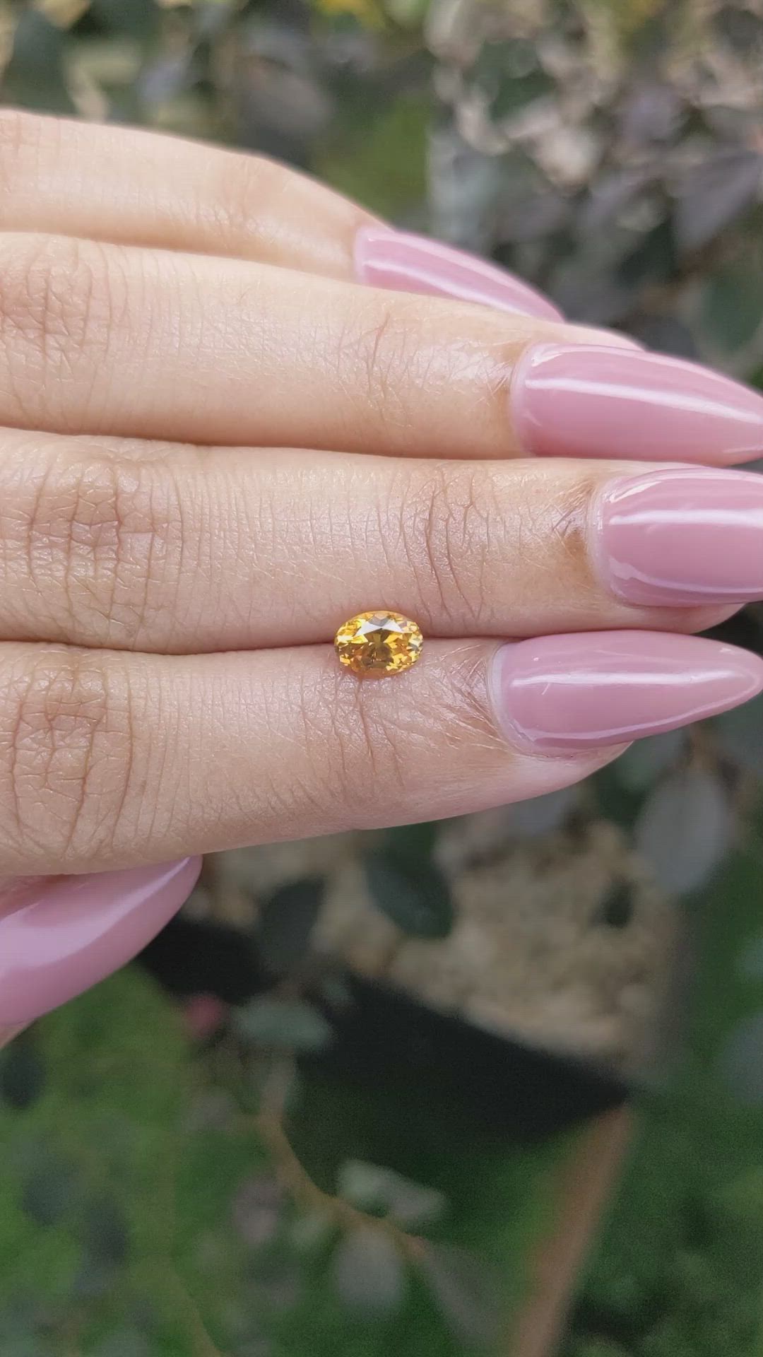 0.75 Ct. Yellowish Orange Sapphire from Ceylon (Sri Lanka) Size Video