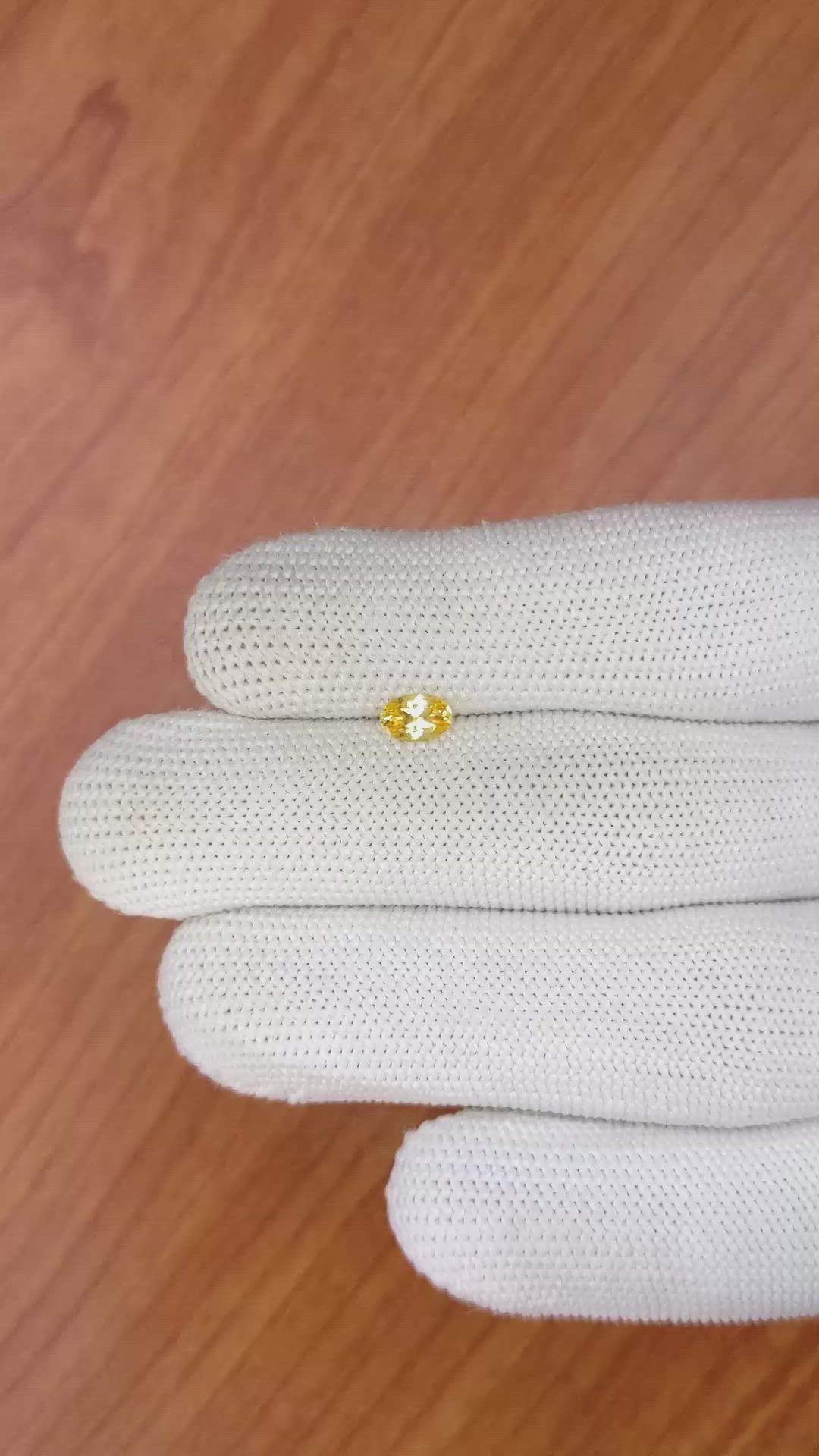 0.45 Ct. Orangish Yellow Sapphire from Ceylon (Sri Lanka) Size Video