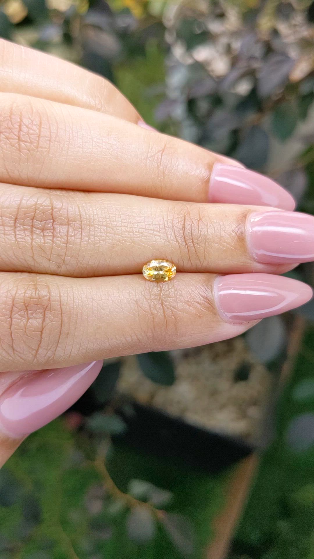 0.45 Ct. Orangish Yellow Sapphire from Ceylon (Sri Lanka) Size Video