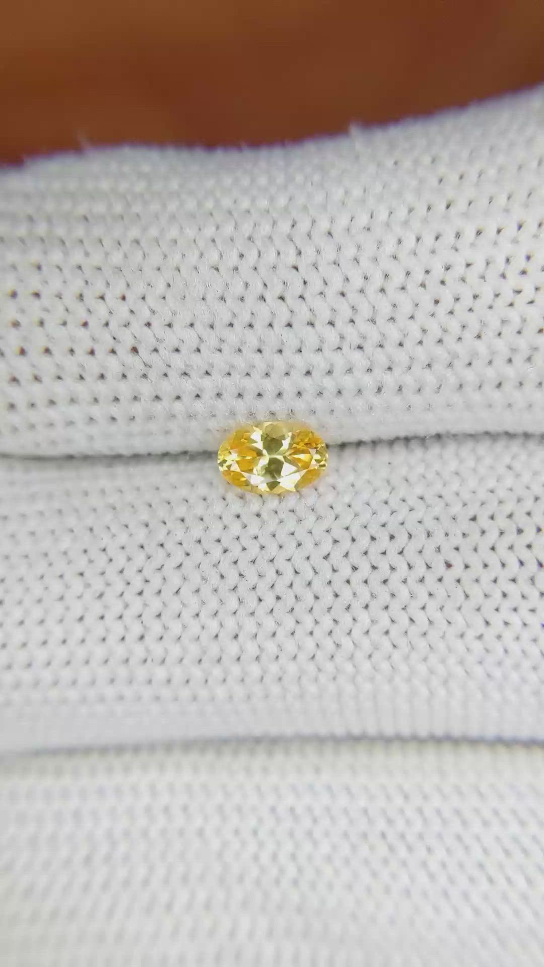 0.45 Ct. Orangish Yellow Sapphire from Ceylon (Sri Lanka) Size Video