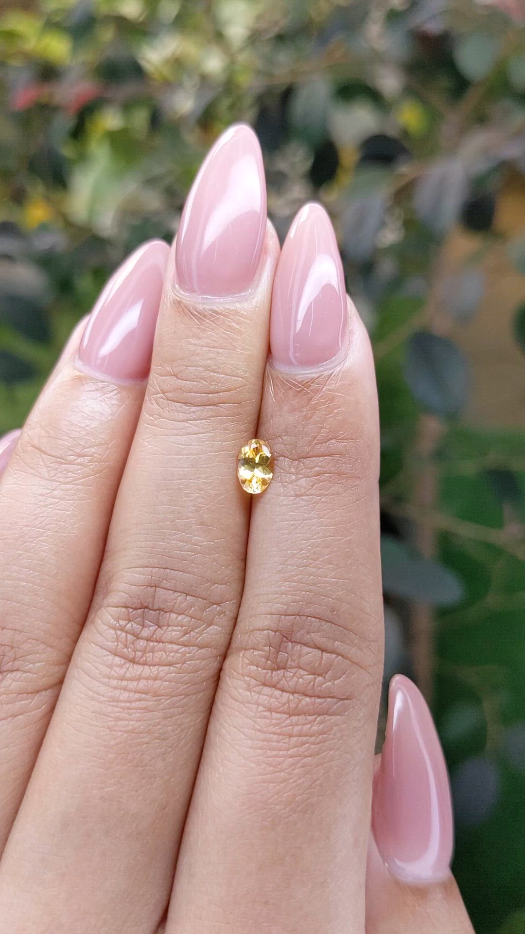 0.45 Ct. Orangish Yellow Sapphire from Ceylon (Sri Lanka) Size Video