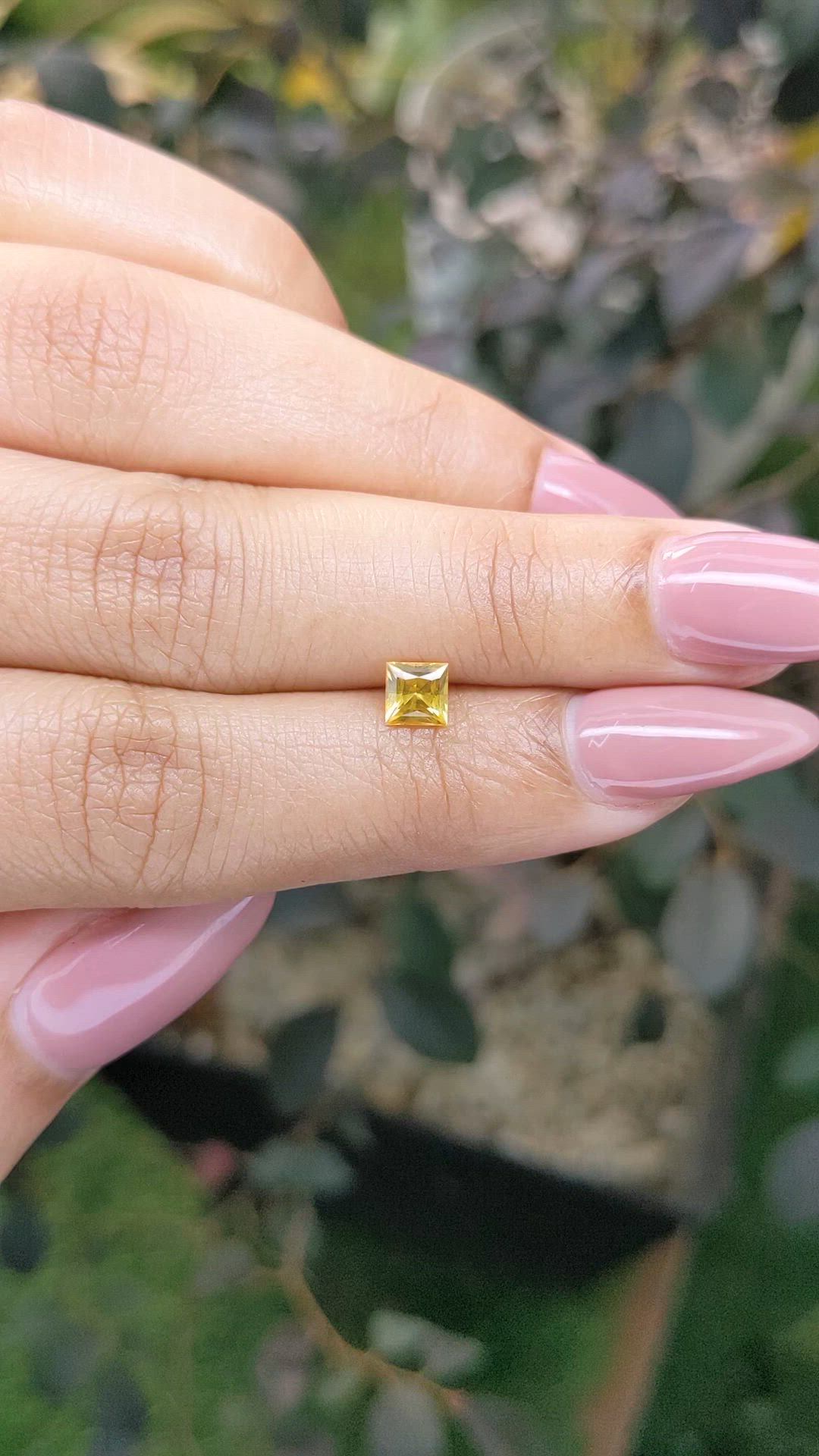 0.54 Ct. Orangish Yellow Sapphire from Ceylon (Sri Lanka) Size Video