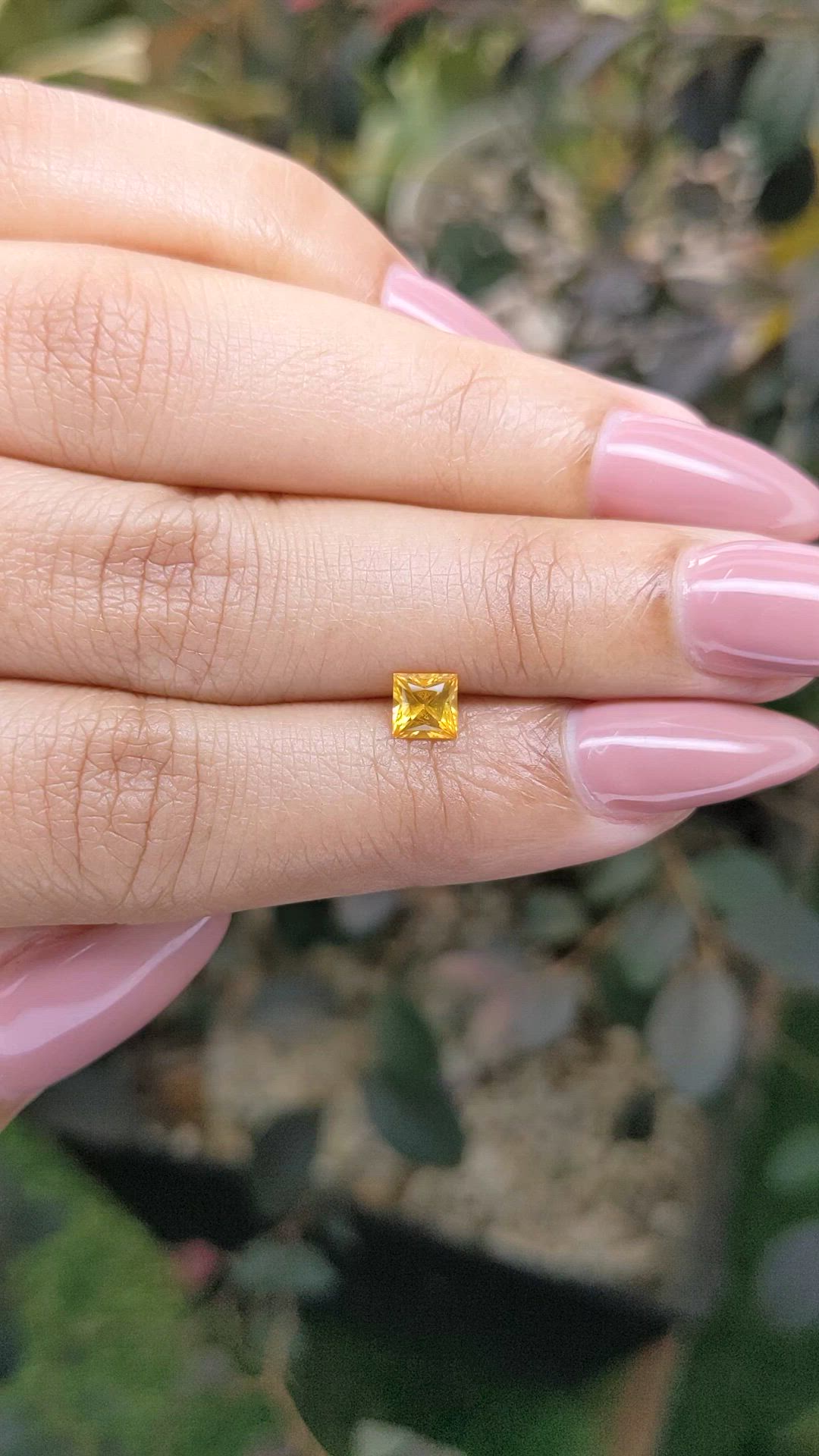 0.59 Ct. Orangish Yellow Sapphire from Ceylon (Sri Lanka) Size Video