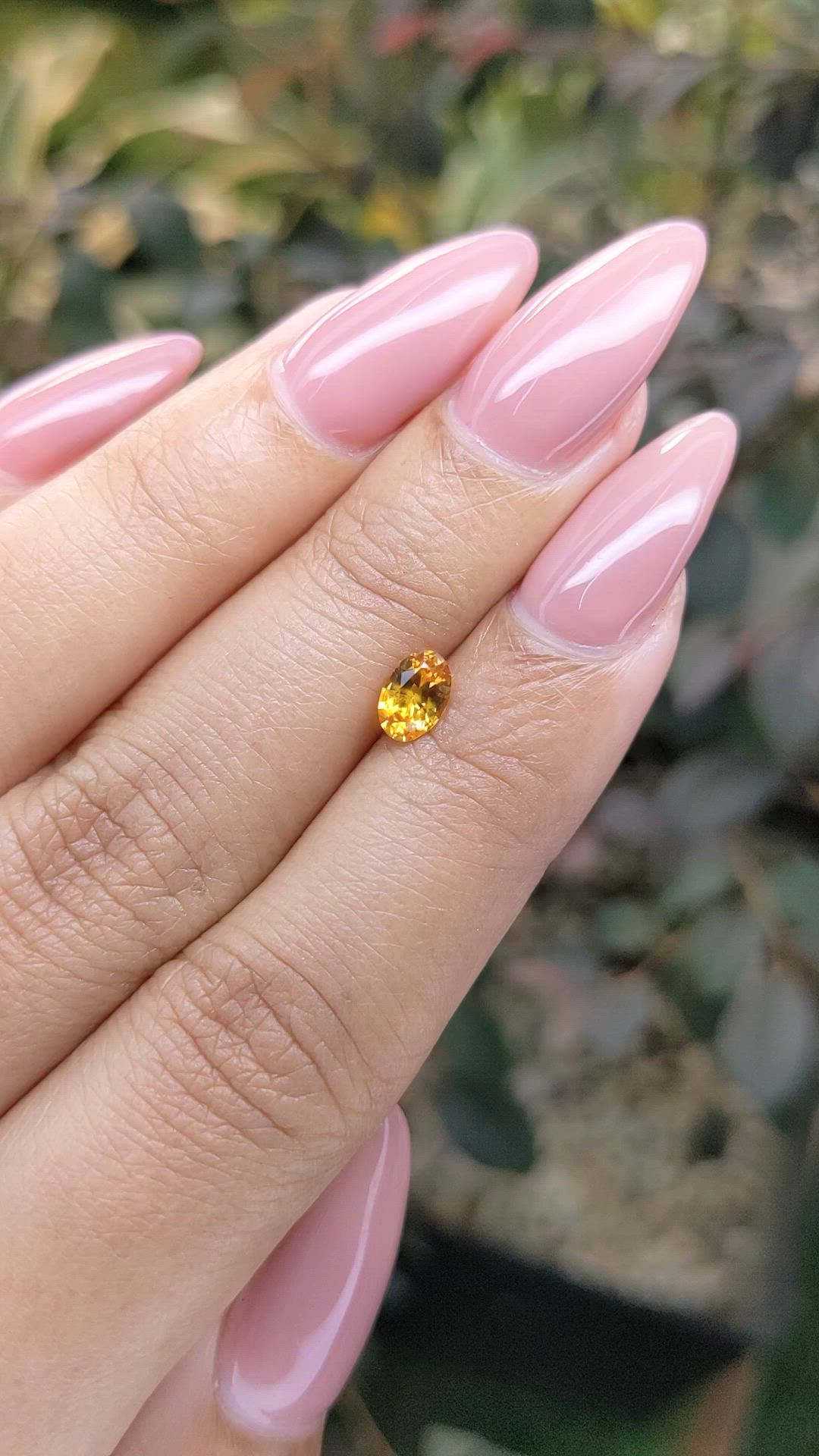 0.57 Ct. Orangish Yellow Sapphire from Ceylon (Sri Lanka) Size Video