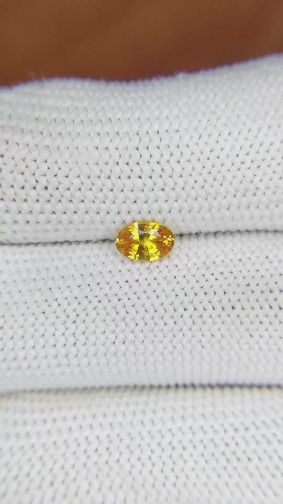 0.57 Ct. Orangish Yellow Sapphire from Ceylon (Sri Lanka) Size Video