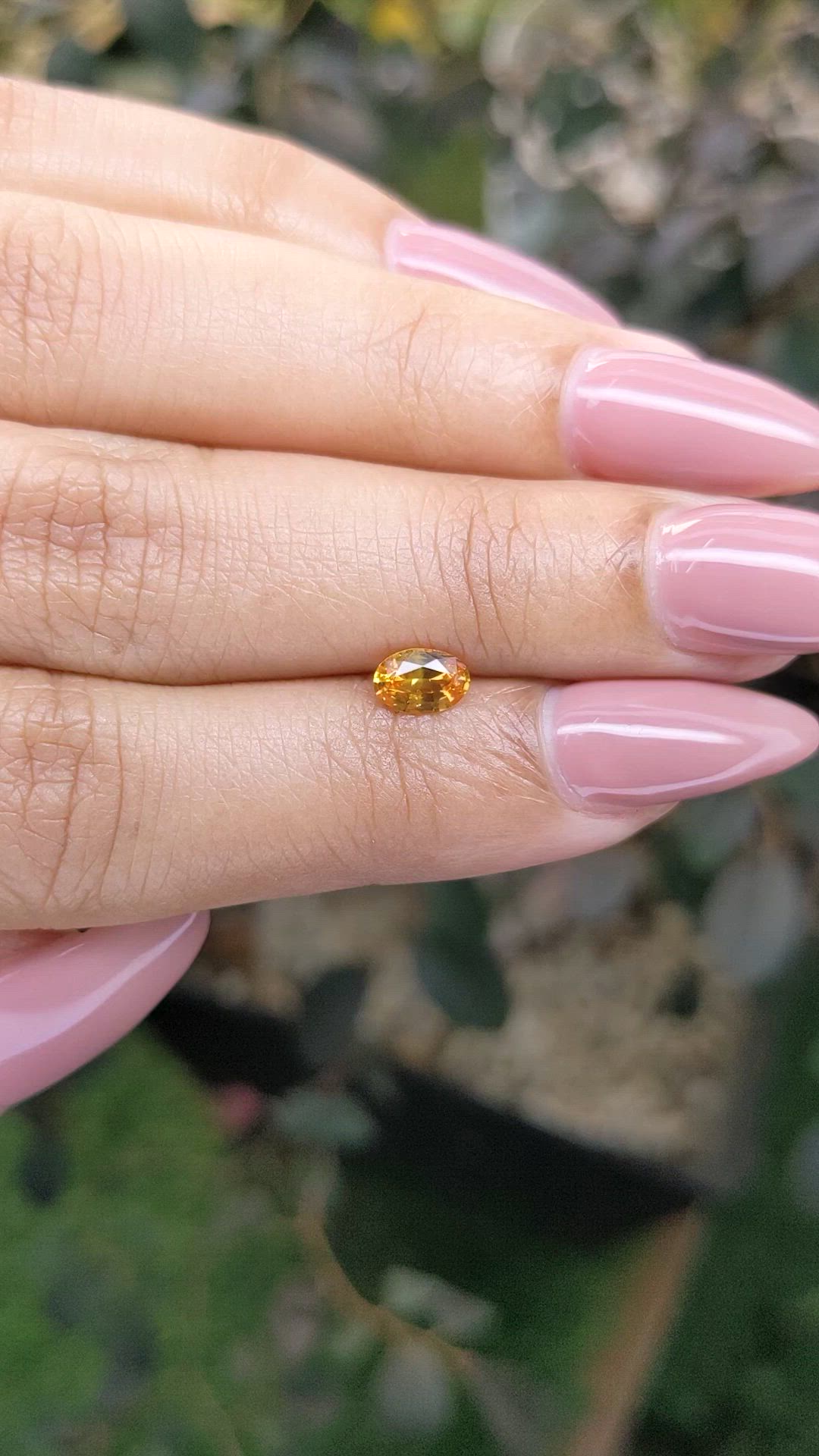 0.57 Ct. Orangish Yellow Sapphire from Ceylon (Sri Lanka) Size Video