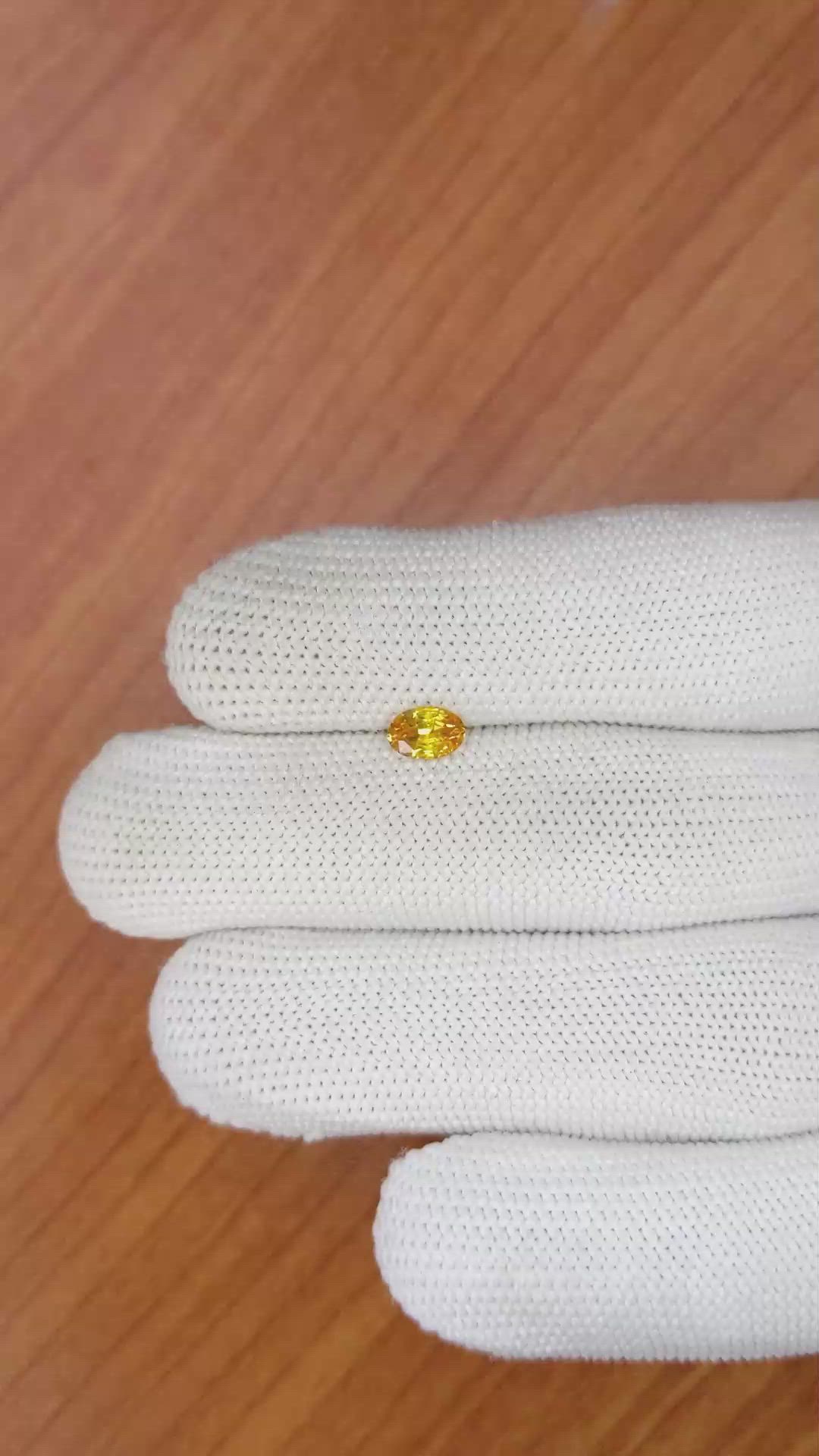 0.57 Ct. Orangish Yellow Sapphire from Ceylon (Sri Lanka) Size Video