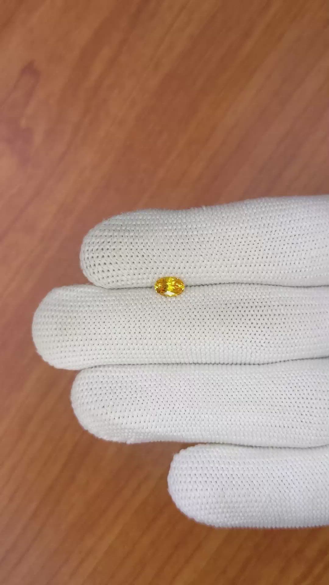 0.60 Ct. Yellowish Orange Sapphire from Ceylon (Sri Lanka) Size Video