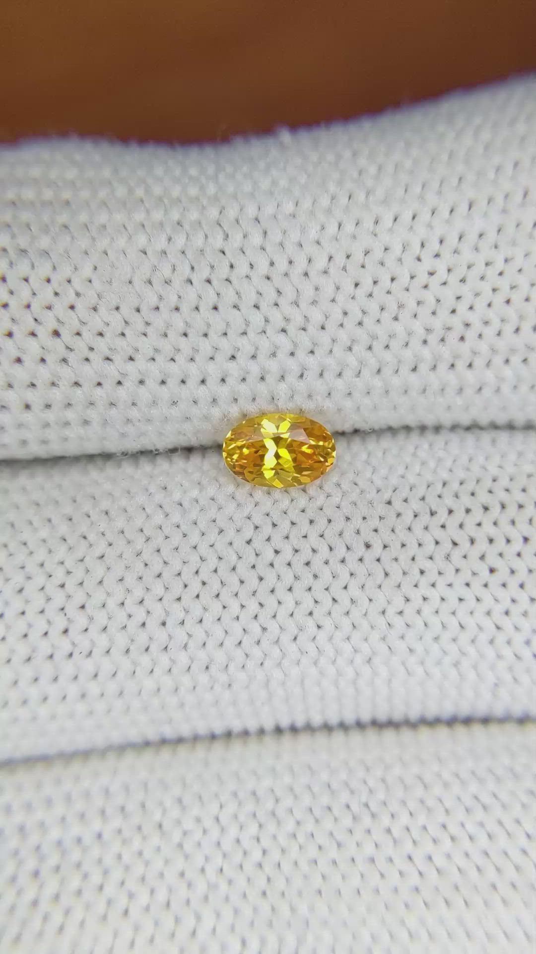 0.60 Ct. Yellowish Orange Sapphire from Ceylon (Sri Lanka) Size Video