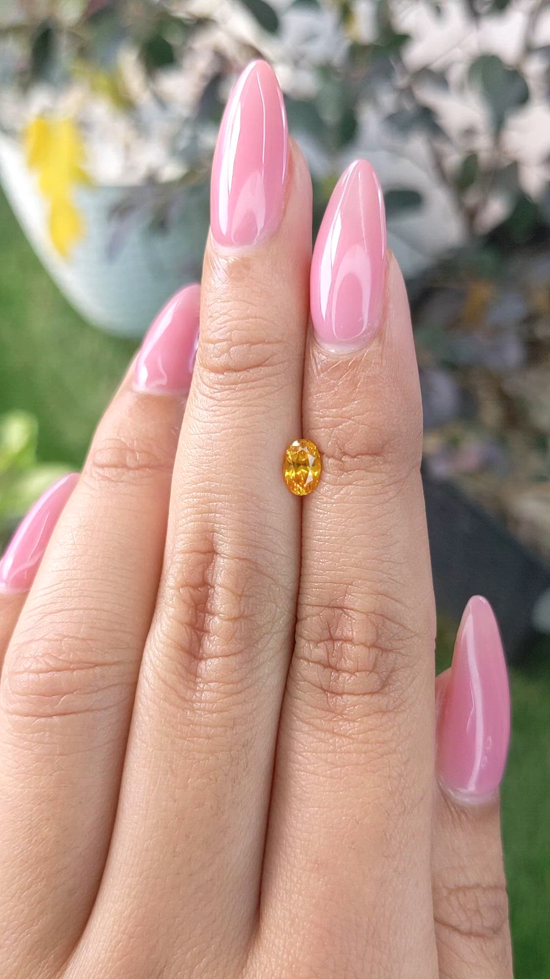 0.60 Ct. Yellowish Orange Sapphire from Ceylon (Sri Lanka) Size Video