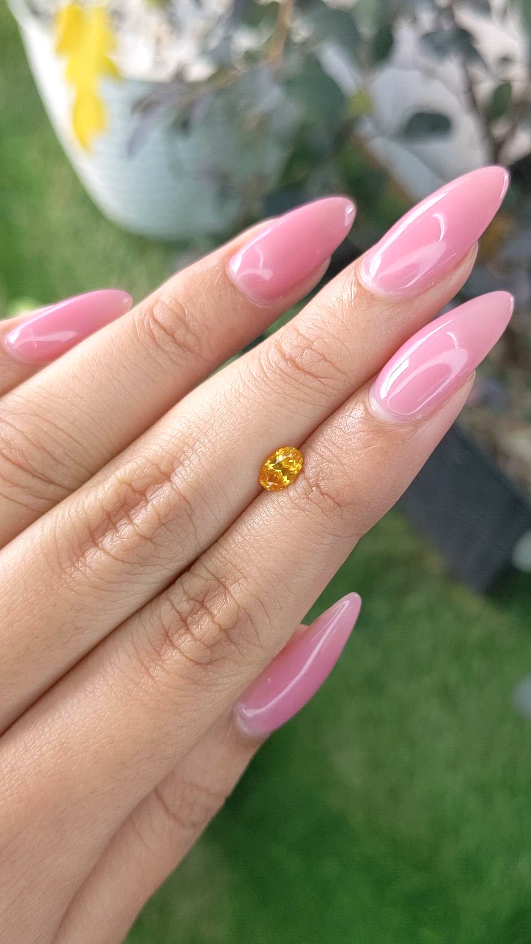 0.60 Ct. Yellowish Orange Sapphire from Ceylon (Sri Lanka) Size Video