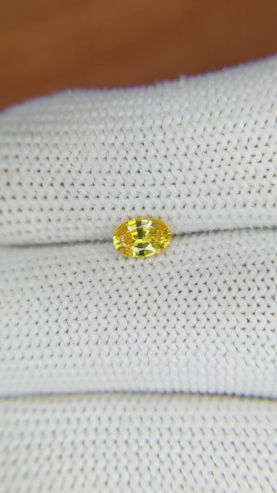 0.58 Ct. Orangish Yellow Sapphire from Ceylon (Sri Lanka) Size Video