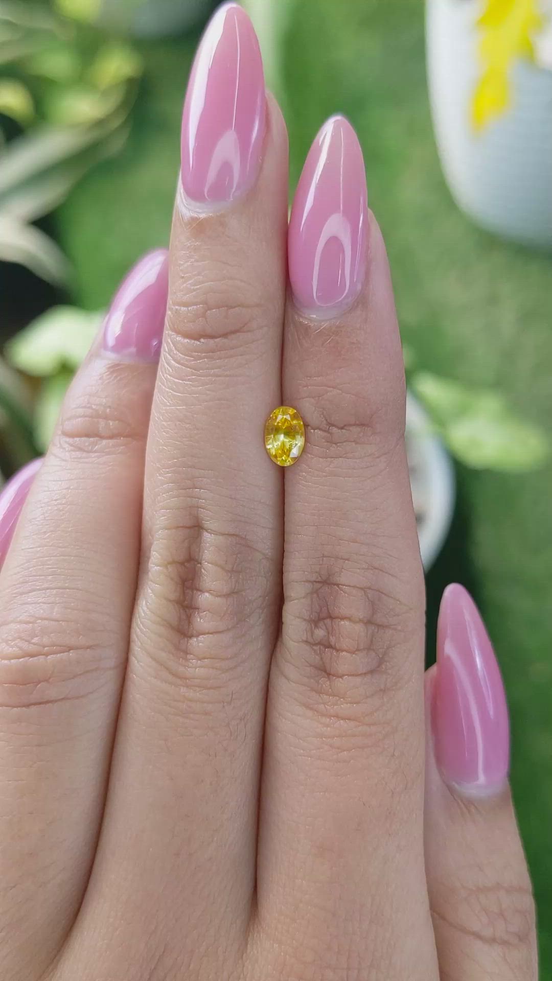 0.58 Ct. Orangish Yellow Sapphire from Ceylon (Sri Lanka) Size Video