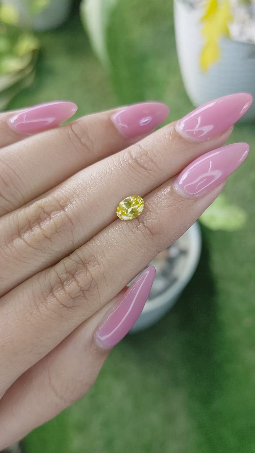 0.84 Ct. Orangish Yellow Sapphire from Ceylon (Sri Lanka) Size Video