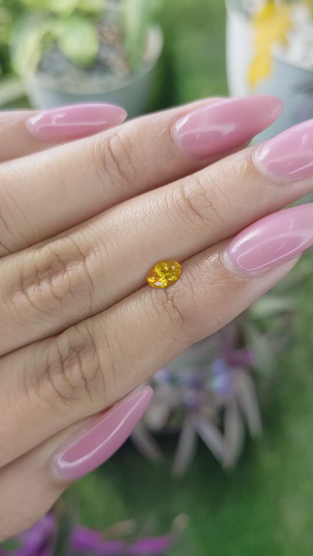 0.55 Ct. Yellowish Orange Sapphire from Ceylon (Sri Lanka) Size Video