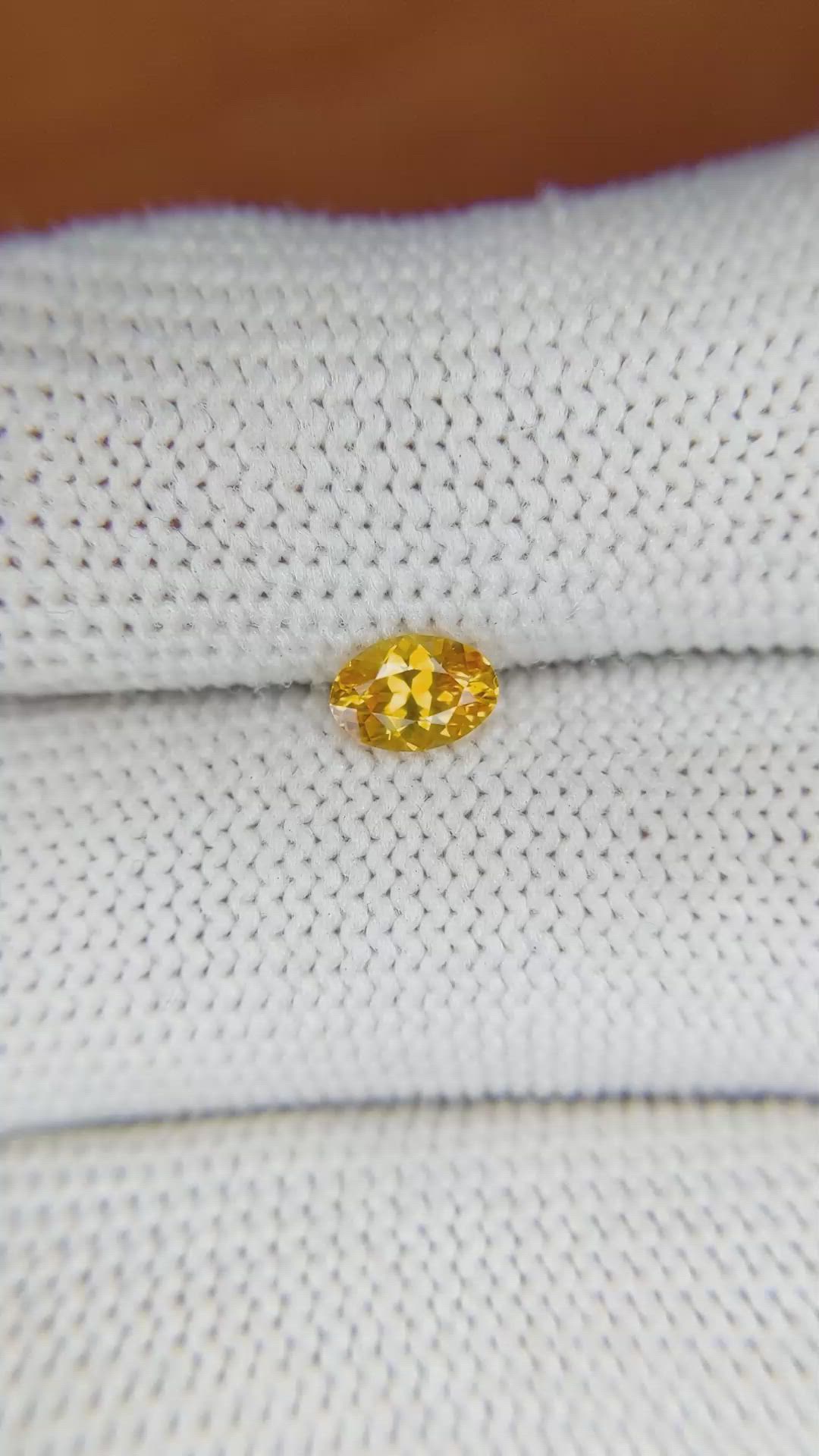 0.53 Ct. Yellowish Orange Sapphire from Ceylon (Sri Lanka) Size Video