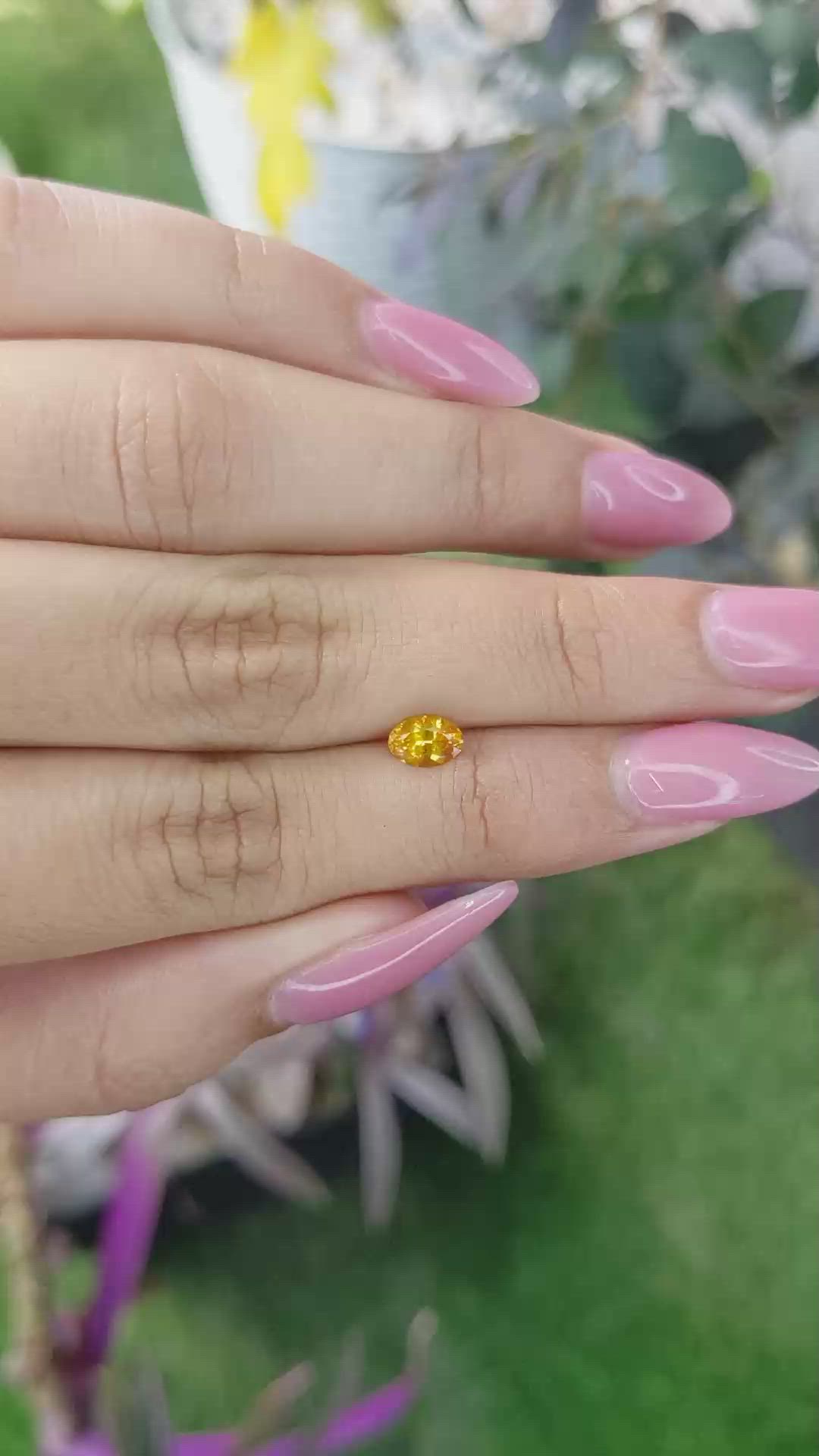 0.53 Ct. Yellowish Orange Sapphire from Ceylon (Sri Lanka) Size Video