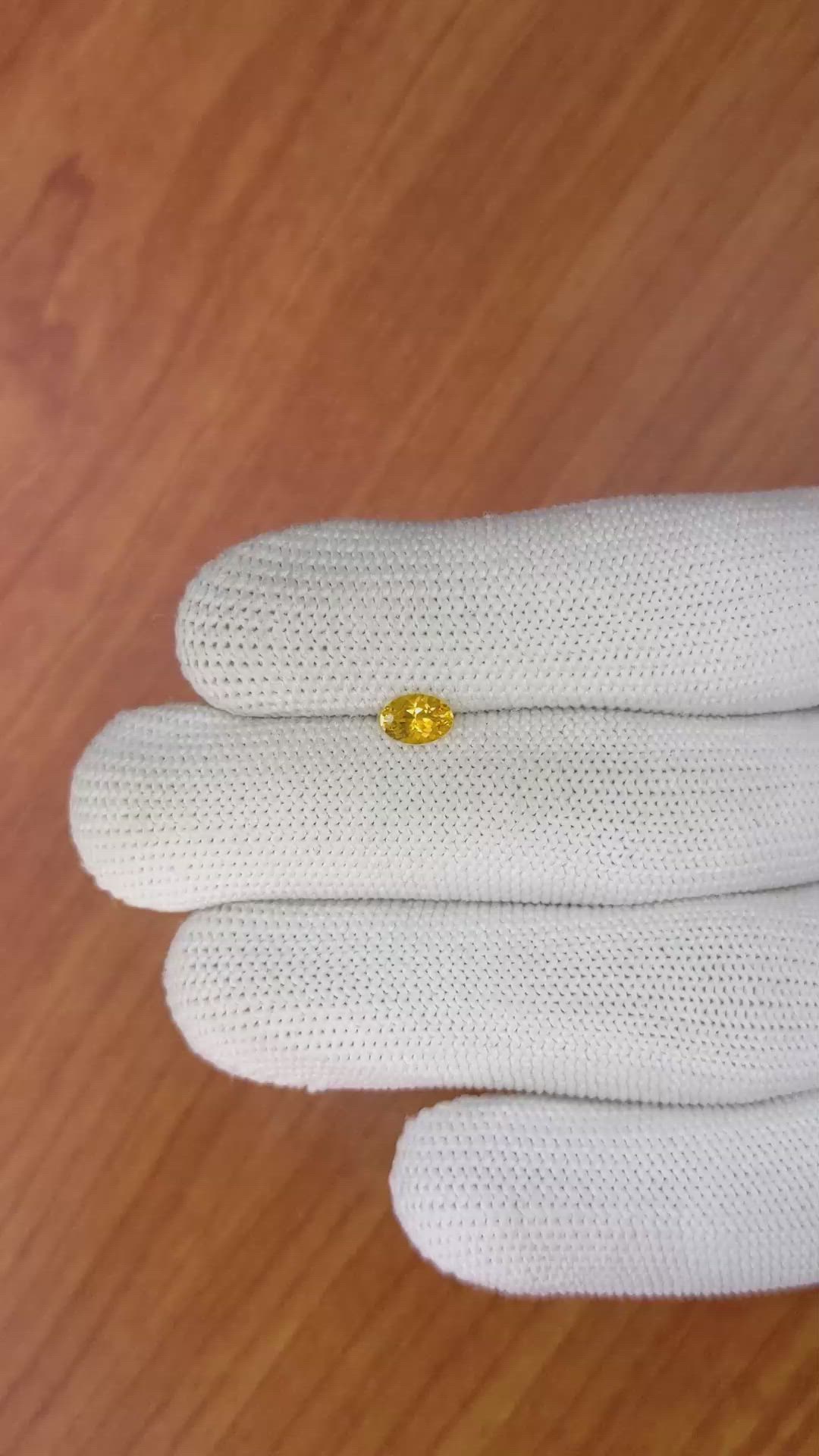 0.53 Ct. Yellowish Orange Sapphire from Ceylon (Sri Lanka) Size Video