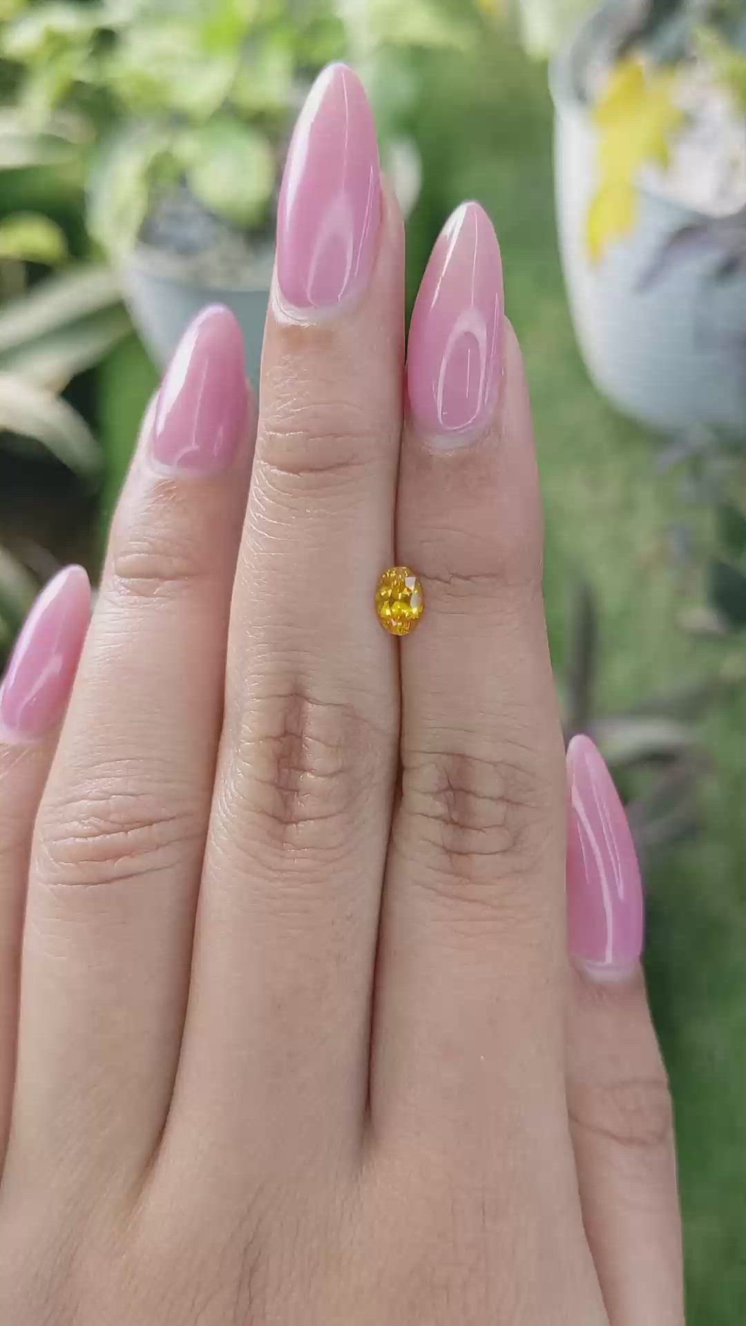 0.53 Ct. Yellowish Orange Sapphire from Ceylon (Sri Lanka) Size Video