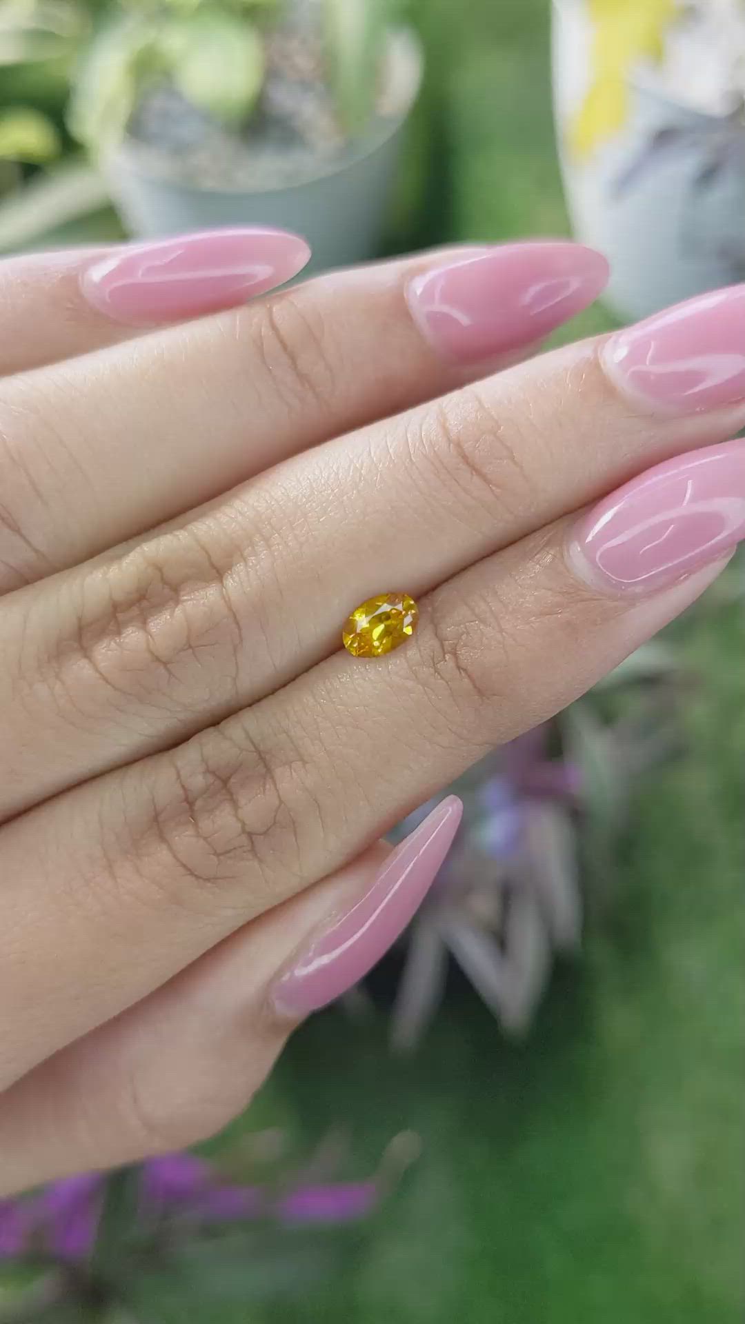 0.50 Ct. Yellowish Orange Sapphire from Ceylon (Sri Lanka) Size Video