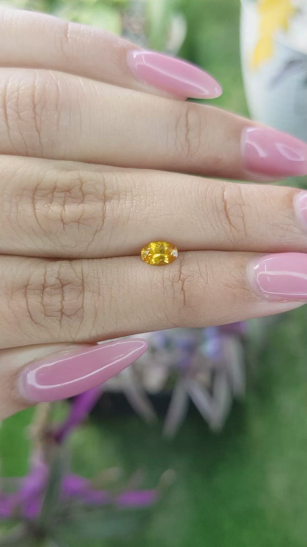 0.50 Ct. Yellowish Orange Sapphire from Ceylon (Sri Lanka) Size Video