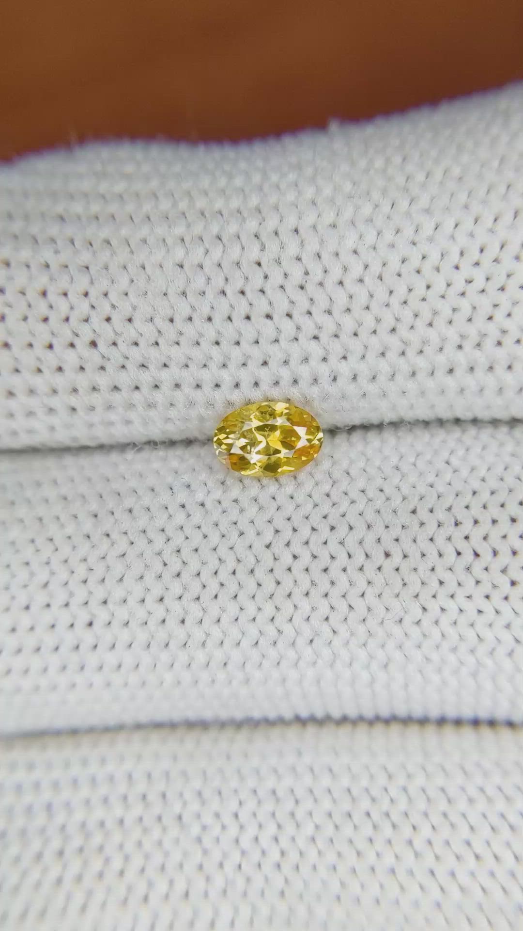 0.51 Ct. Orangish Yellow Sapphire from Ceylon (Sri Lanka) Size Video