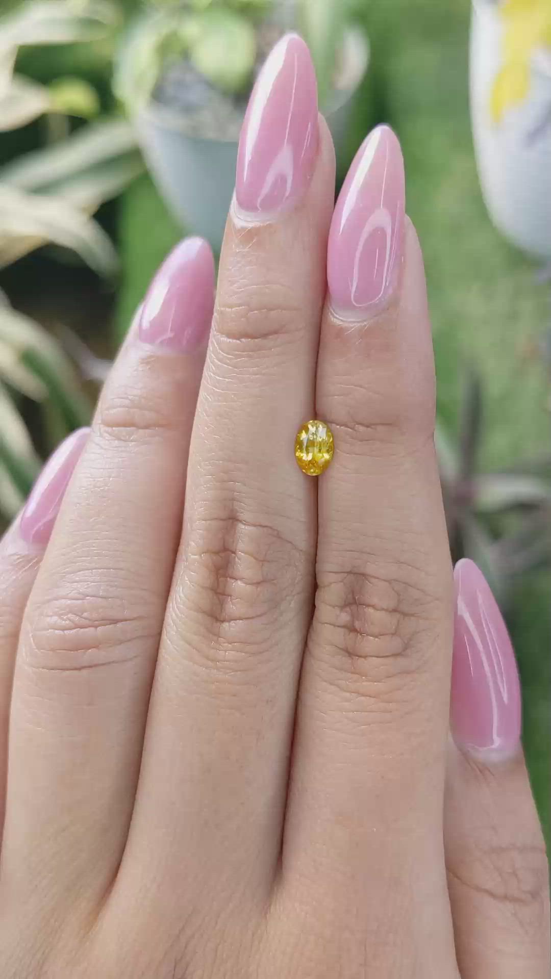 0.51 Ct. Orangish Yellow Sapphire from Ceylon (Sri Lanka) Size Video