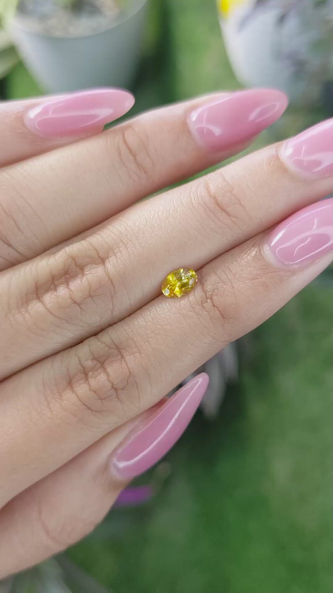 0.51 Ct. Orangish Yellow Sapphire from Ceylon (Sri Lanka) Size Video