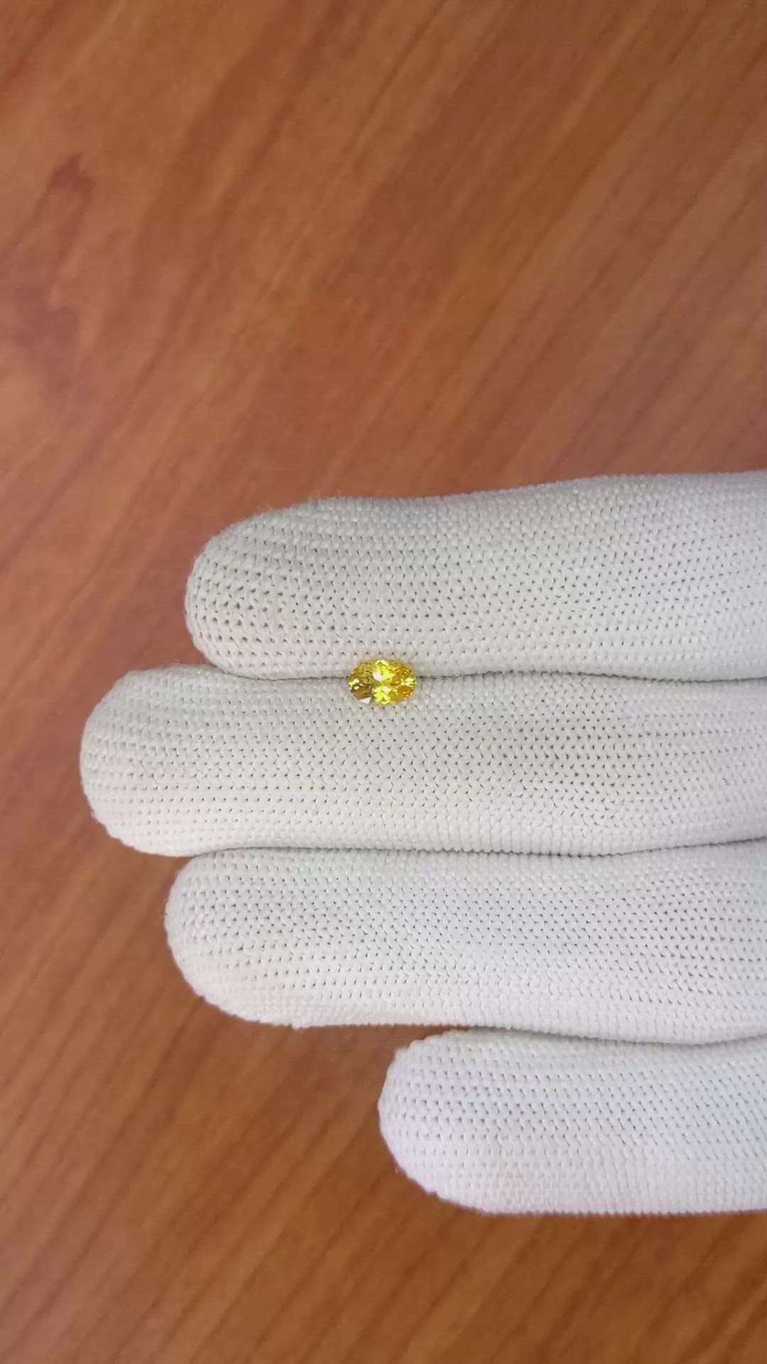 0.51 Ct. Orangish Yellow Sapphire from Ceylon (Sri Lanka) Size Video