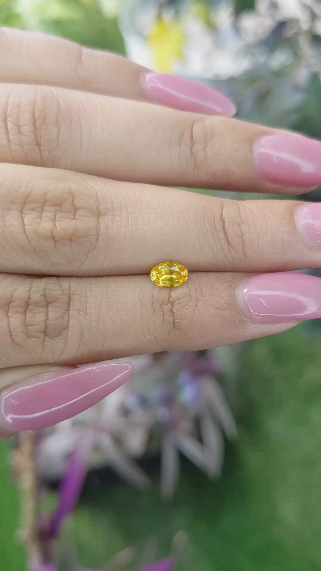 0.54 Ct. Orangish Yellow Sapphire from Ceylon (Sri Lanka) Size Video
