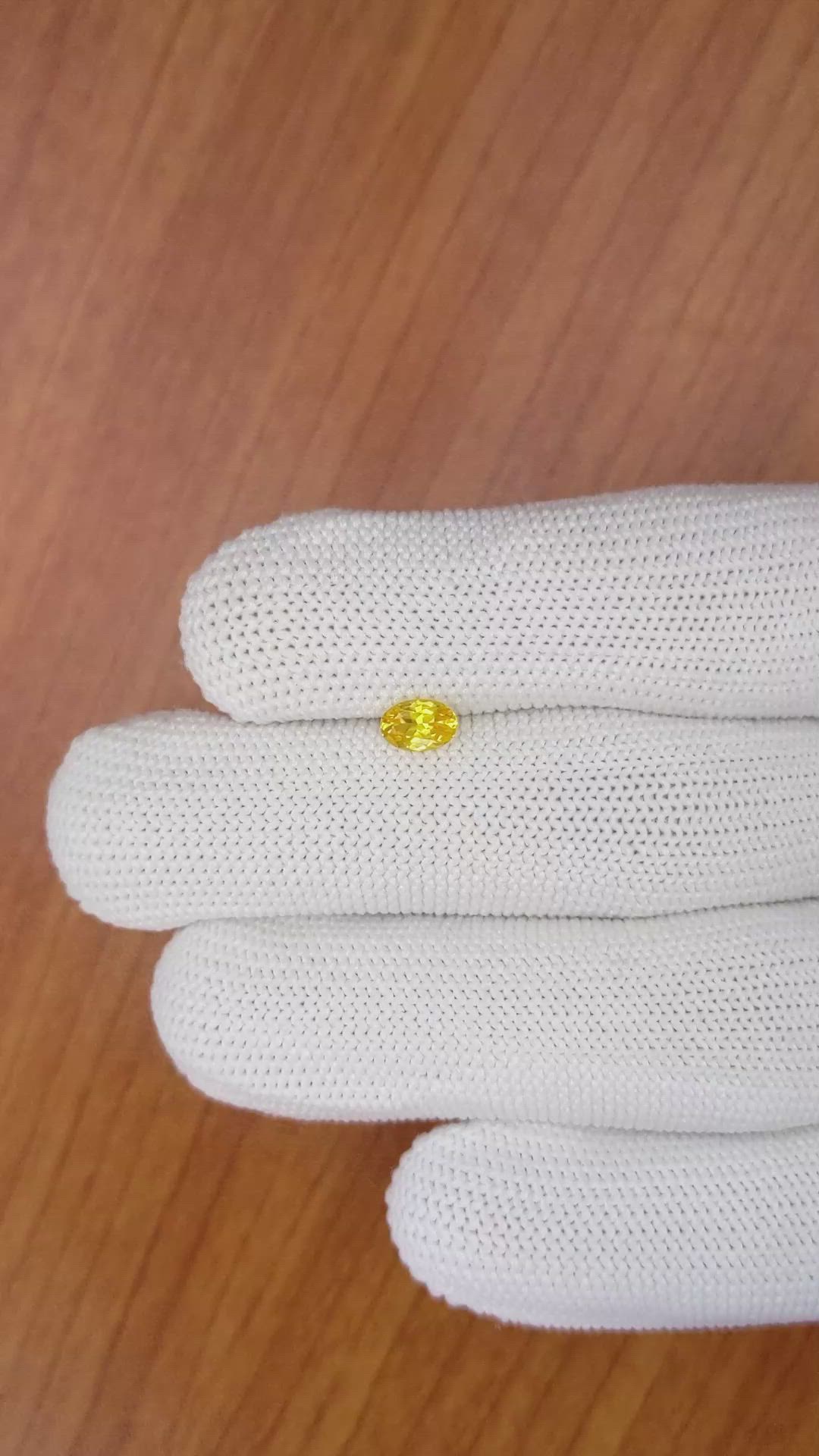 0.54 Ct. Orangish Yellow Sapphire from Ceylon (Sri Lanka) Size Video