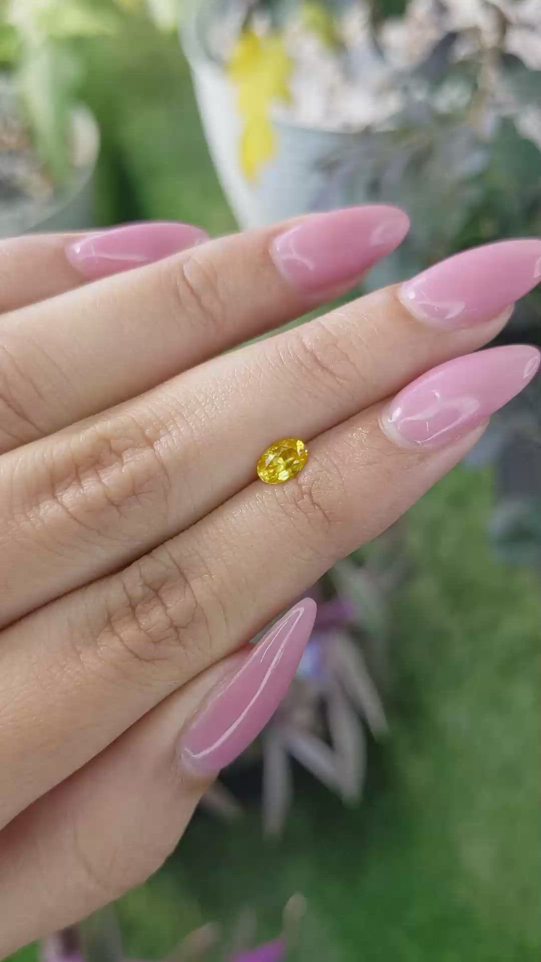 0.54 Ct. Orangish Yellow Sapphire from Ceylon (Sri Lanka) Size Video