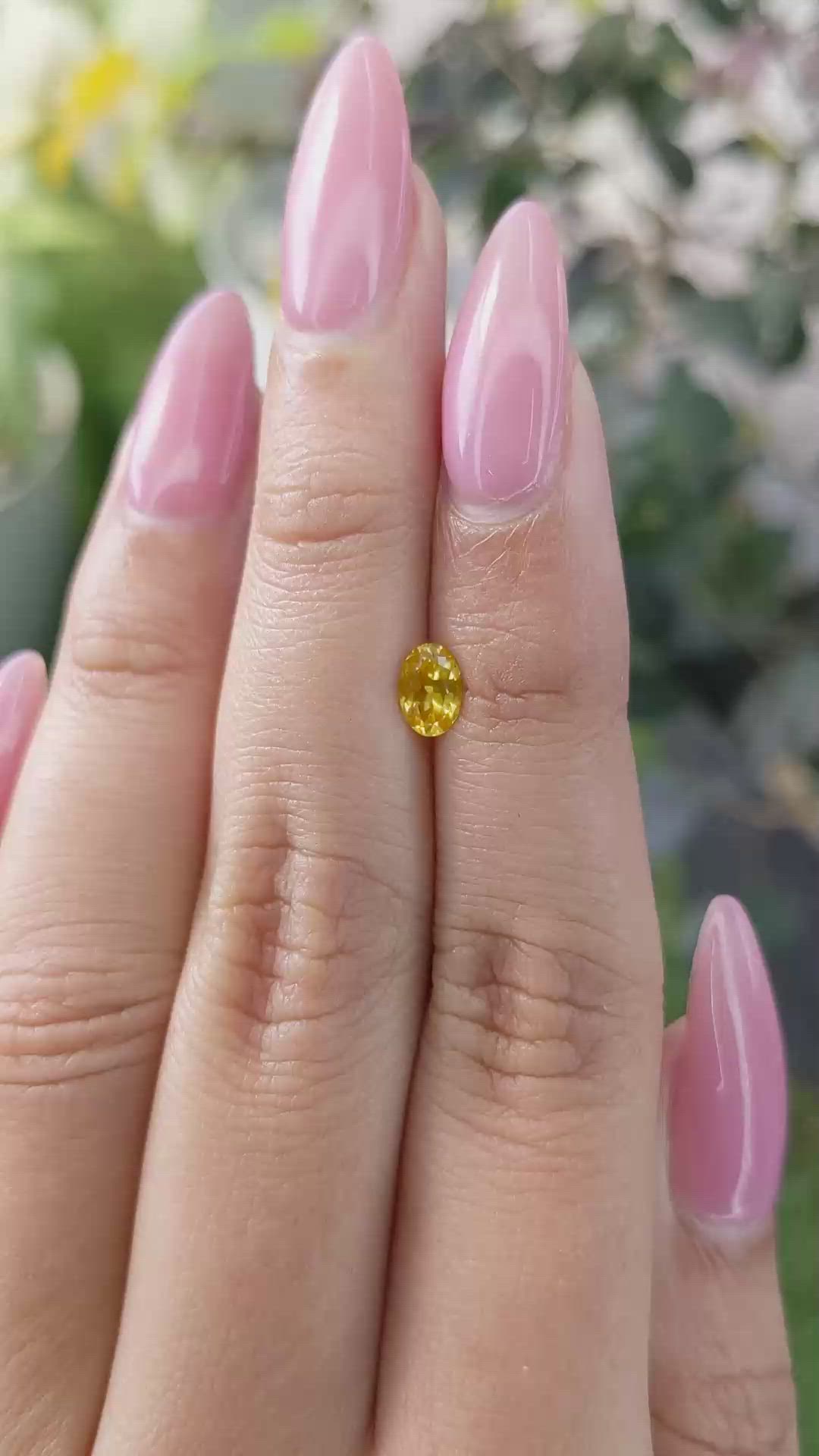 0.54 Ct. Orangish Yellow Sapphire from Ceylon (Sri Lanka) Size Video