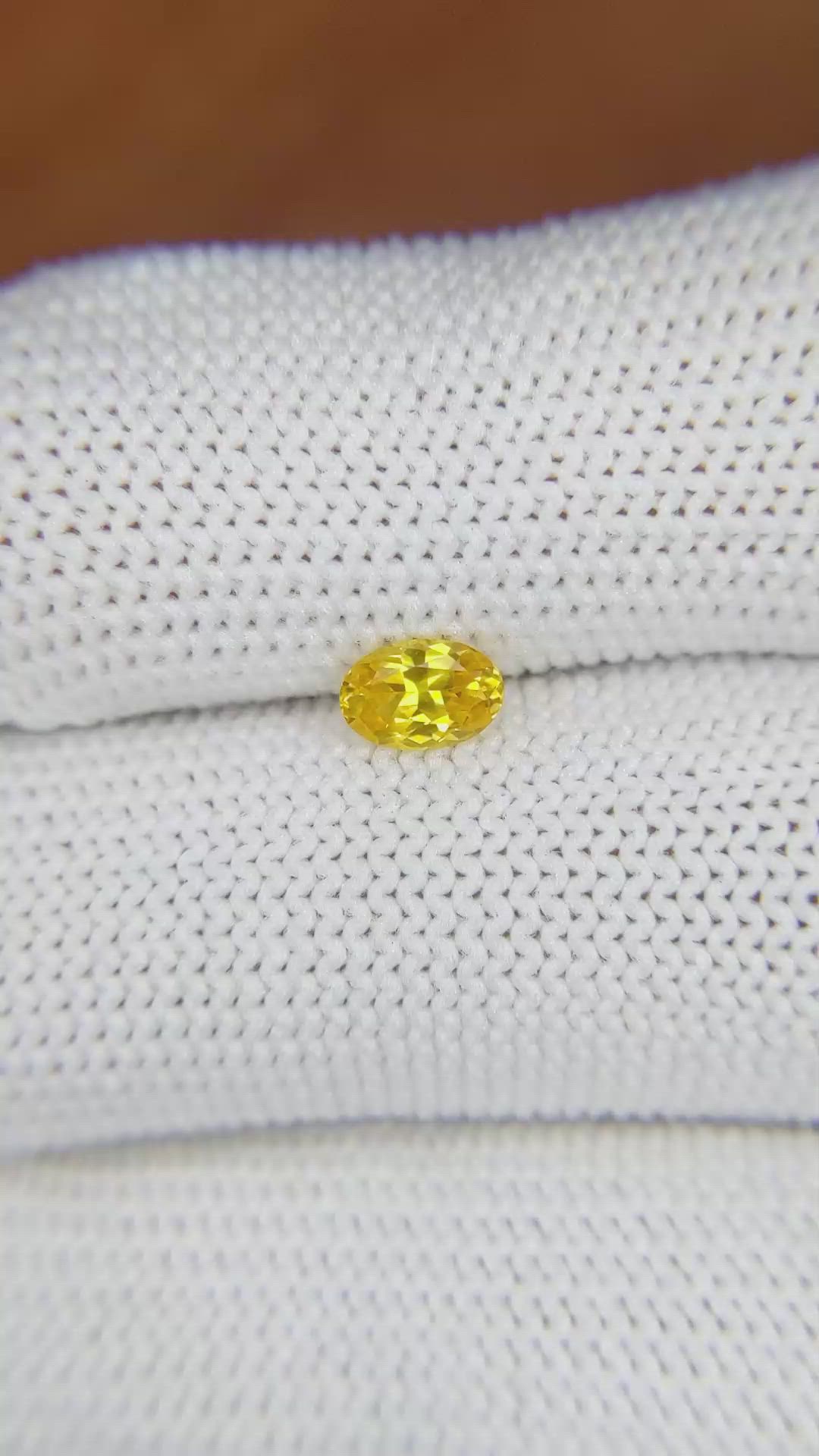 0.54 Ct. Orangish Yellow Sapphire from Ceylon (Sri Lanka) Size Video