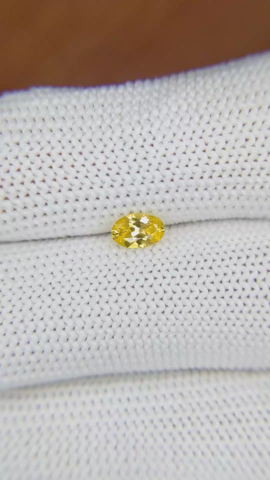 0.40 Ct. Orangish Yellow Sapphire from Ceylon (Sri Lanka) Size Video