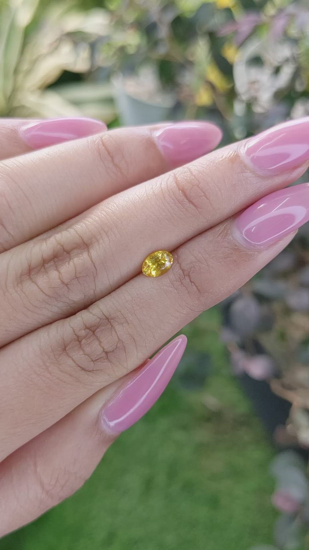 0.60 Ct. Orangish Yellow Sapphire from Ceylon (Sri Lanka) Size Video