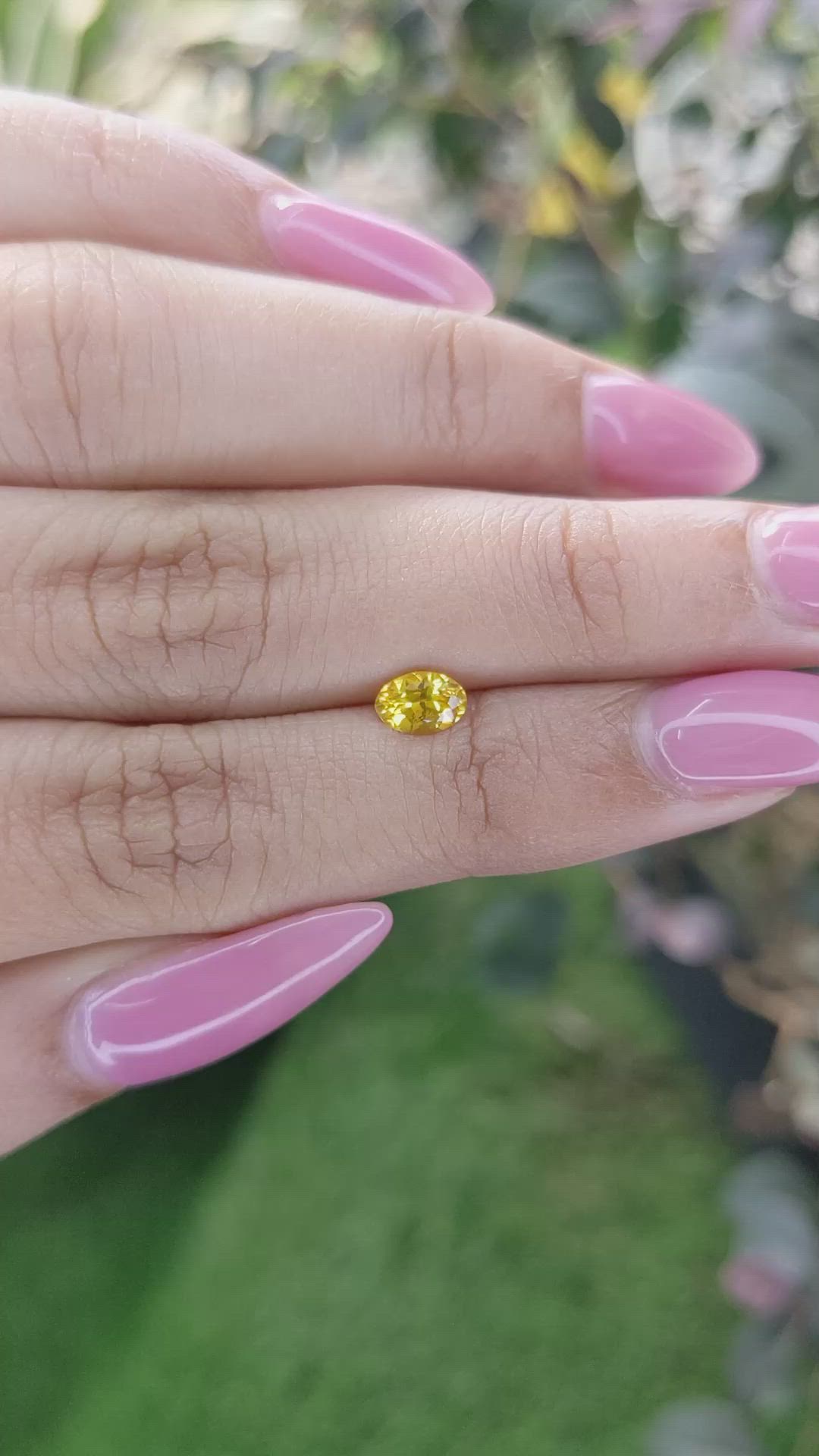 0.60 Ct. Orangish Yellow Sapphire from Ceylon (Sri Lanka) Size Video