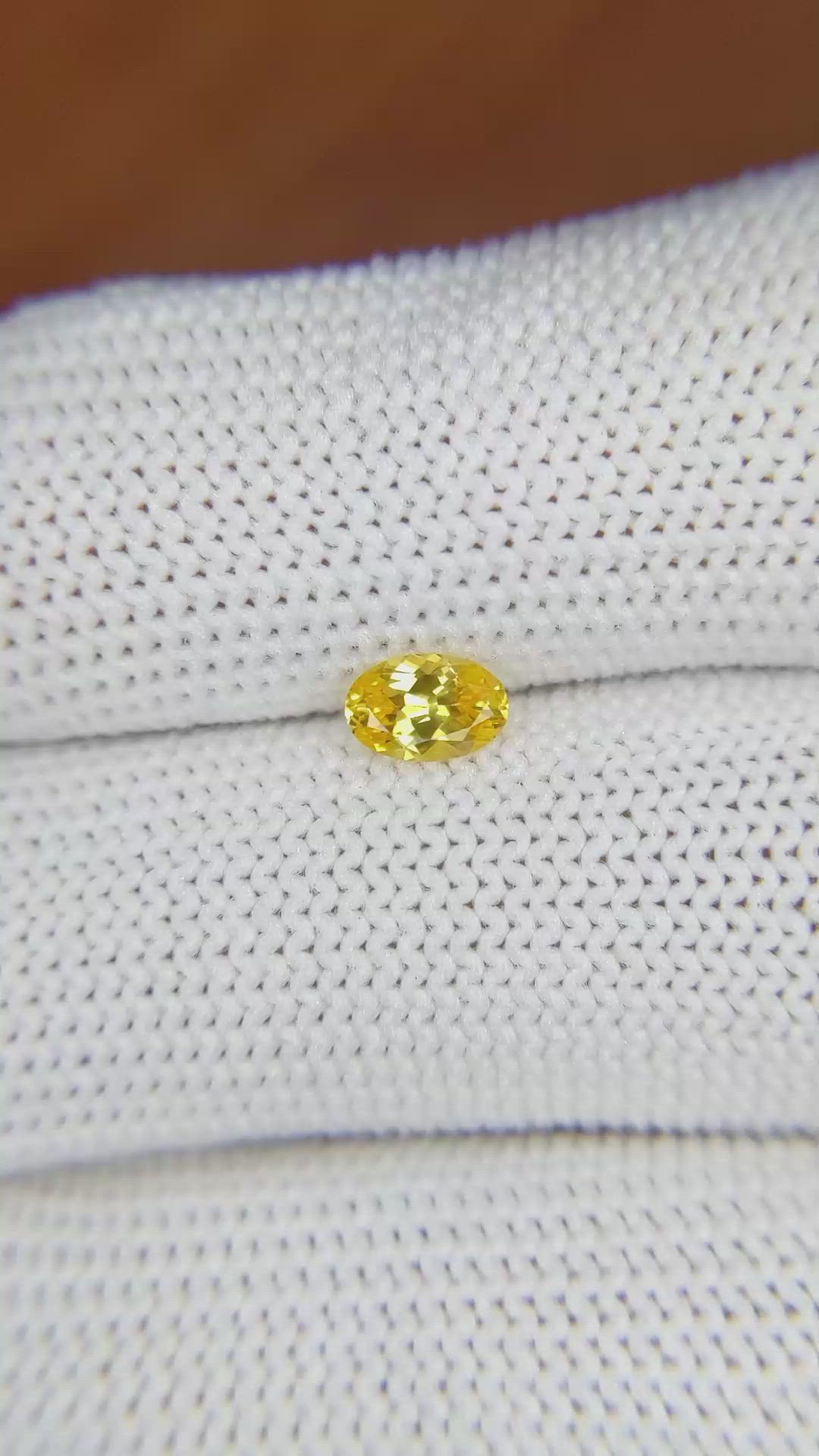 0.43 Ct. Orangish Yellow Sapphire from Ceylon (Sri Lanka) Size Video