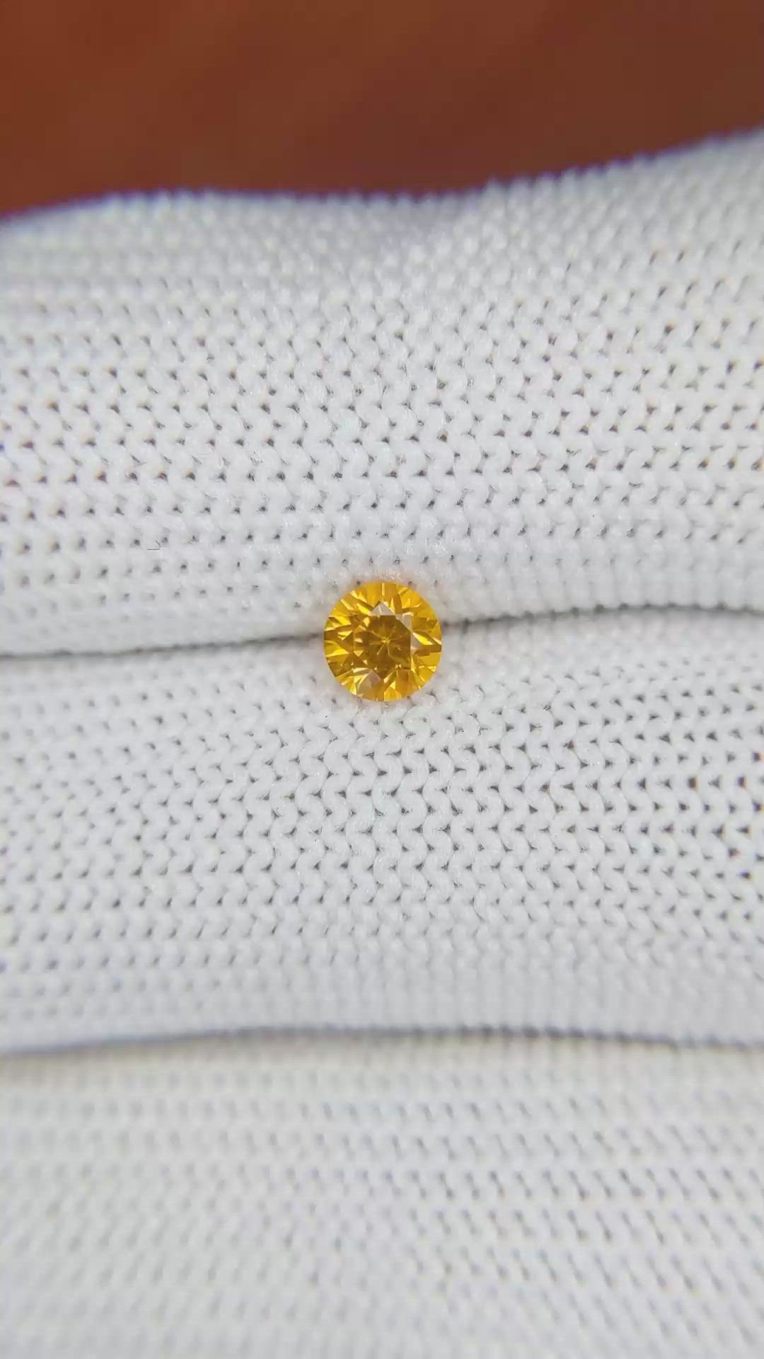 0.56 Ct. Yellowish Orange Sapphire from Ceylon (Sri Lanka) Size Video