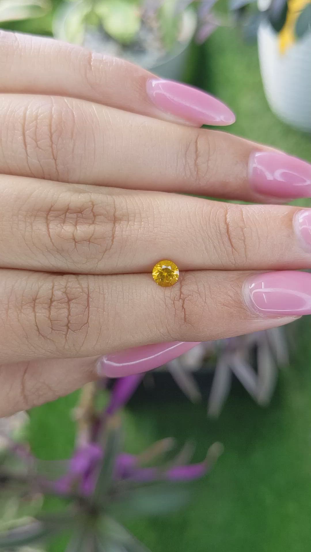 0.56 Ct. Yellowish Orange Sapphire from Ceylon (Sri Lanka) Size Video