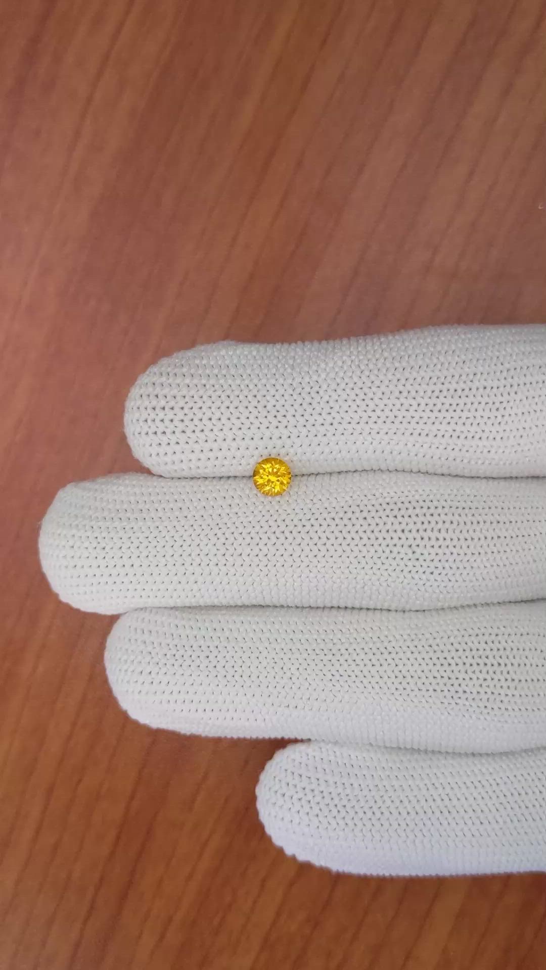 0.56 Ct. Yellowish Orange Sapphire from Ceylon (Sri Lanka) Size Video