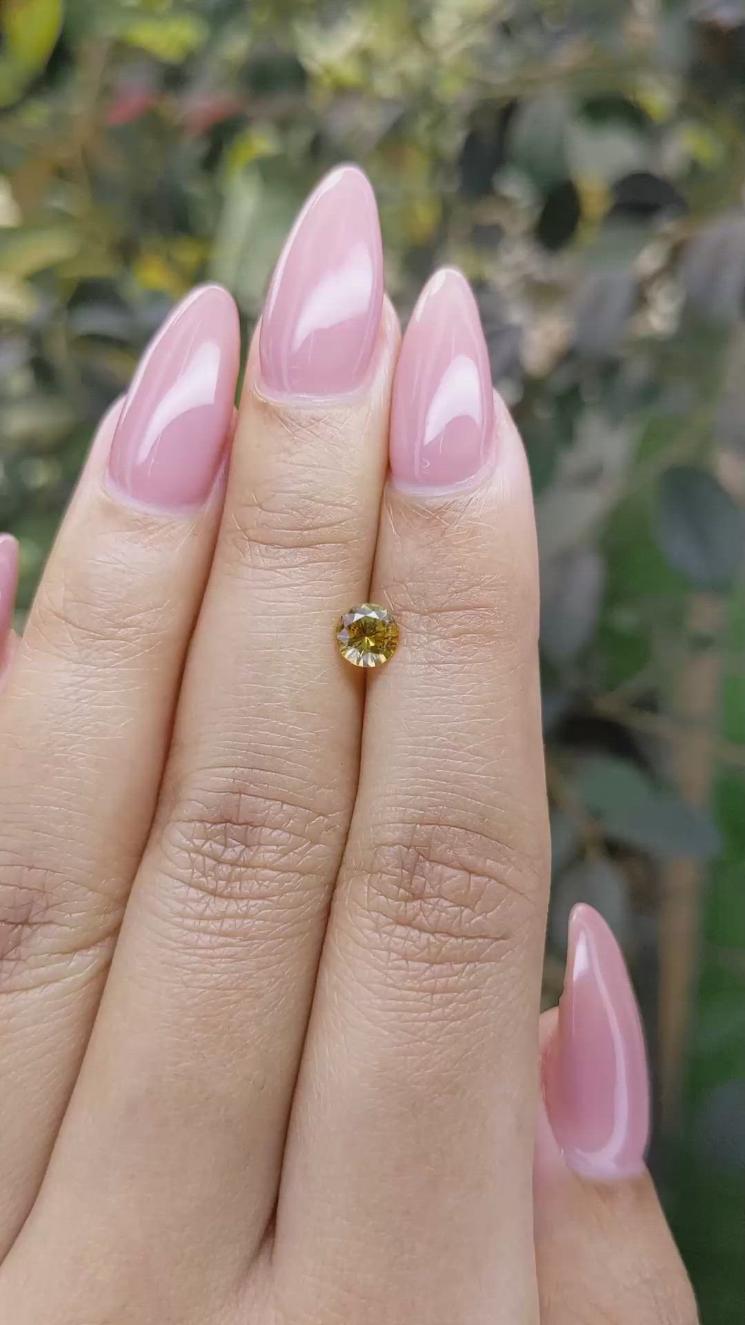 0.57 Ct. Yellowish Orange Sapphire from Ceylon (Sri Lanka) Size Video