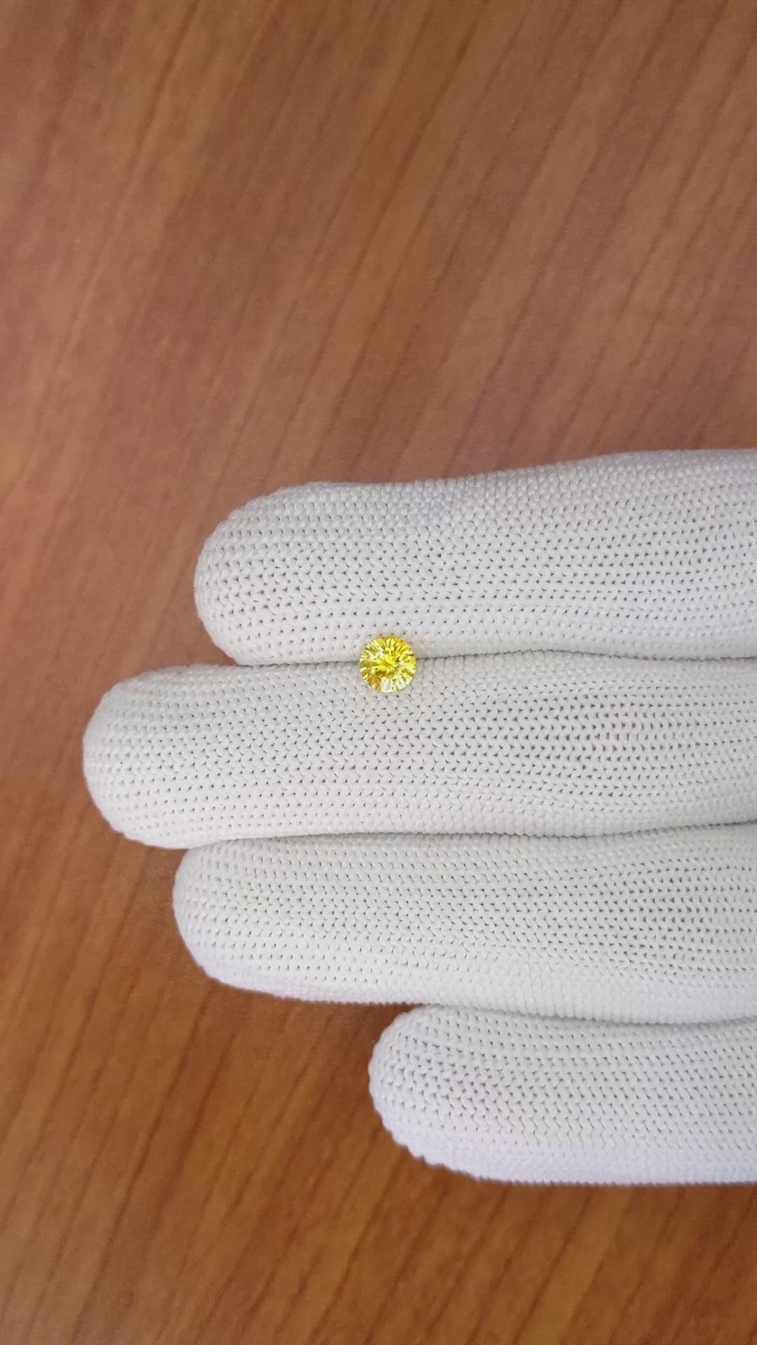 0.57 Ct. Yellowish Orange Sapphire from Ceylon (Sri Lanka) Size Video