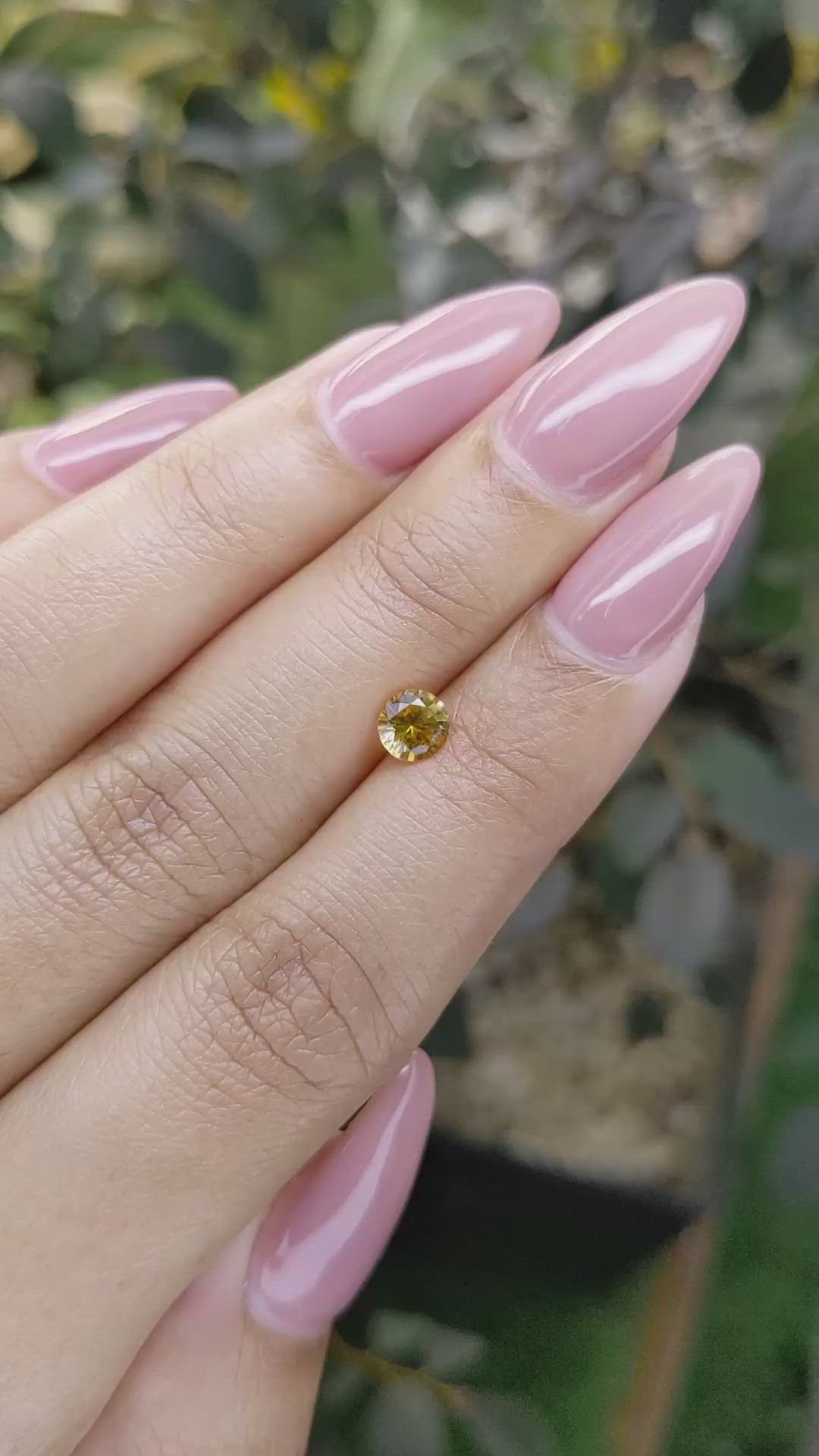 0.57 Ct. Yellowish Orange Sapphire from Ceylon (Sri Lanka) Size Video