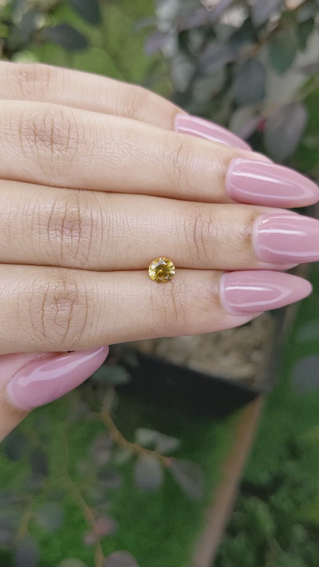 0.57 Ct. Yellowish Orange Sapphire from Ceylon (Sri Lanka) Size Video